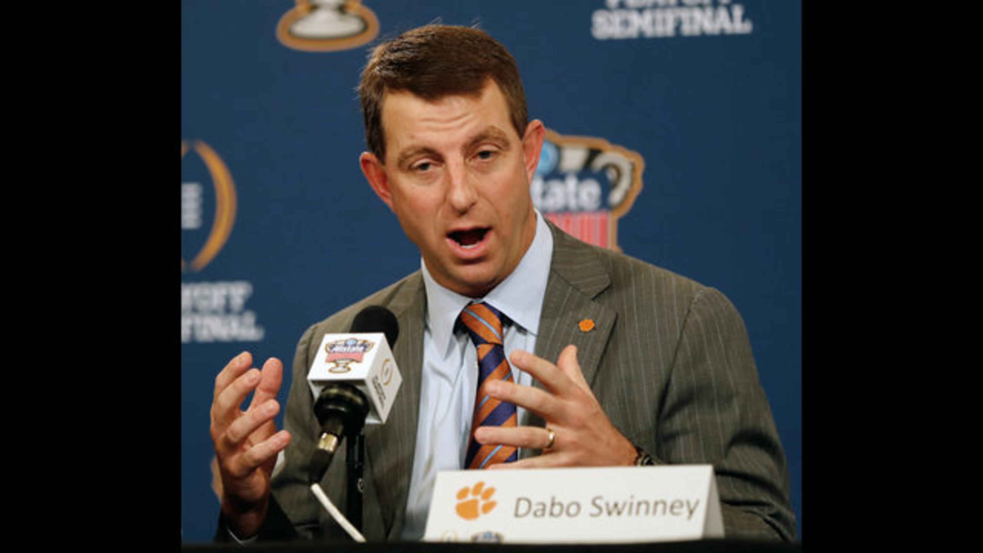 In this Dec. 31, 2017, file photo, Clemson head coach Dabo Swinney speaks at a news conference for the Sugar Bowl NCAA college football bowl game, in New Orleans. This spring was a busy one around the Atlantic Coast Conference _ especially for the returning quarterbacks who won division titles last season.(AP Photo/Gerald Herbert, File)