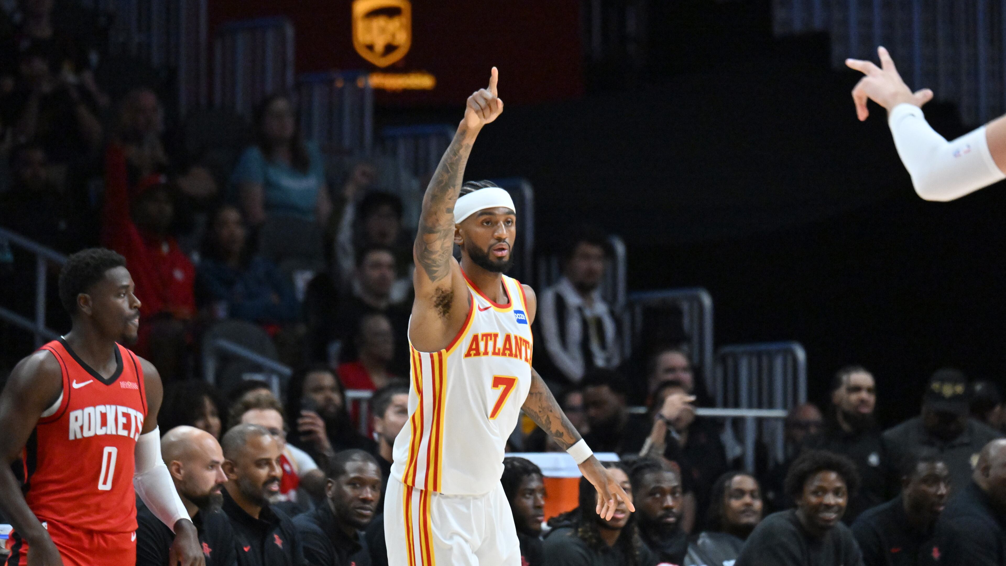 Atlanta Hawks guard Nickeil Alexander-Walker (7) reacts after scoring during the first half in a preseason NBA basketball game at State Farm Arena, Thursday, October 16, 2025, in Atlanta. Houston Rockets won 133-115 over Atlanta Hawks. (Hyosub Shin / AJC)