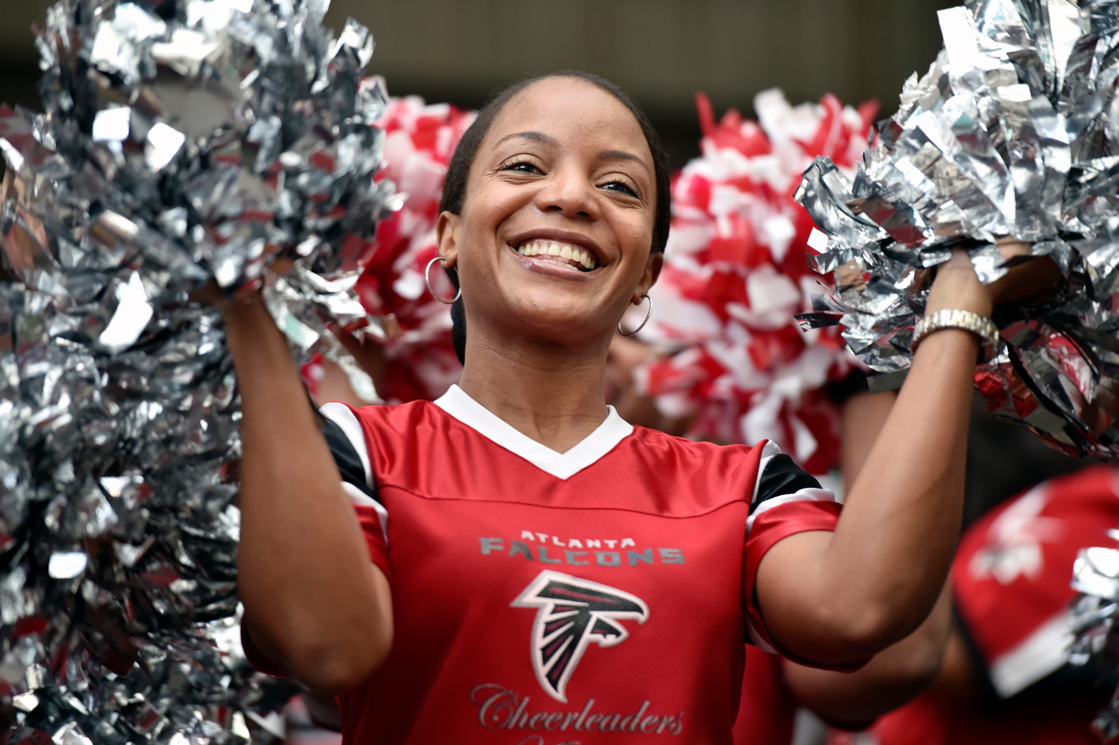 January 20, 2017, Atlanta - Former Falcons cheerleaders dance and lead festivities during a pep rally for the upcoming NFC Championship game against the Packers in Atlanta, Georgia, on Friday, January 20, 2017. (DAVID BARNES / DAVID.BARNES@AJC.COM)