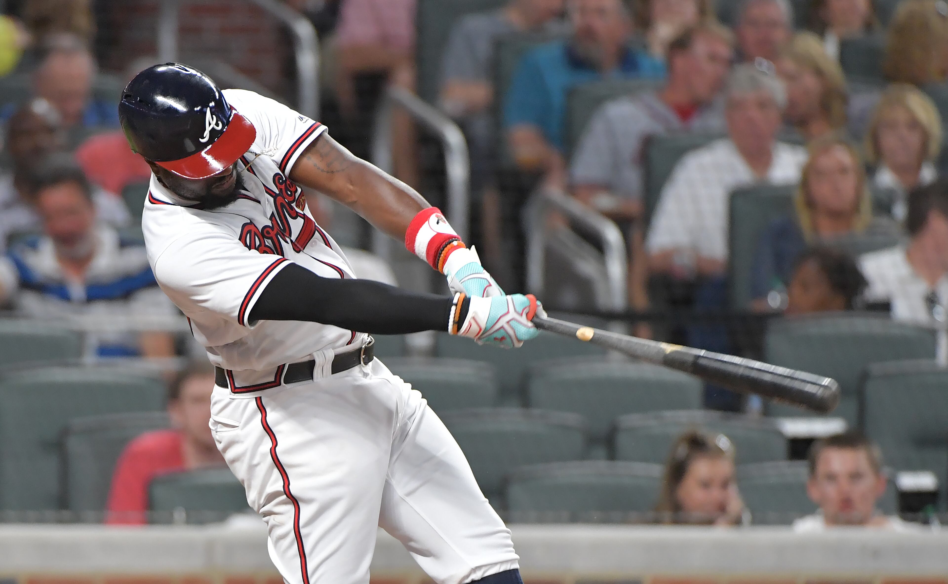 Brandon Phillips hits a solo homer in the 6th inning at SunTrust Park on Saturday, April 15, 2017.