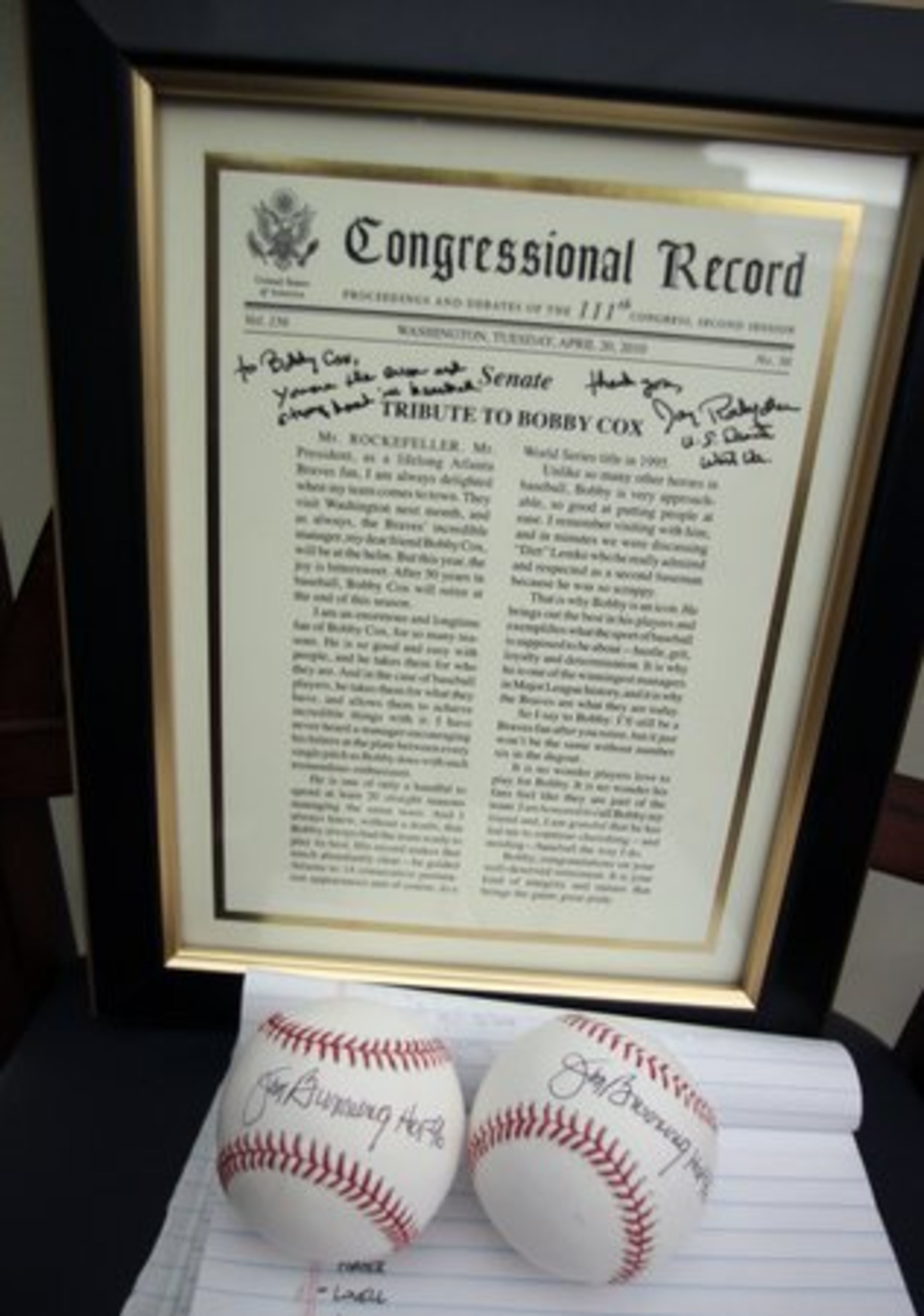A statement placed in the Congressional Record saluting Cox's career along with along with two baseballs signed by Bunning, a member of the National Baseball Hall of Fame.