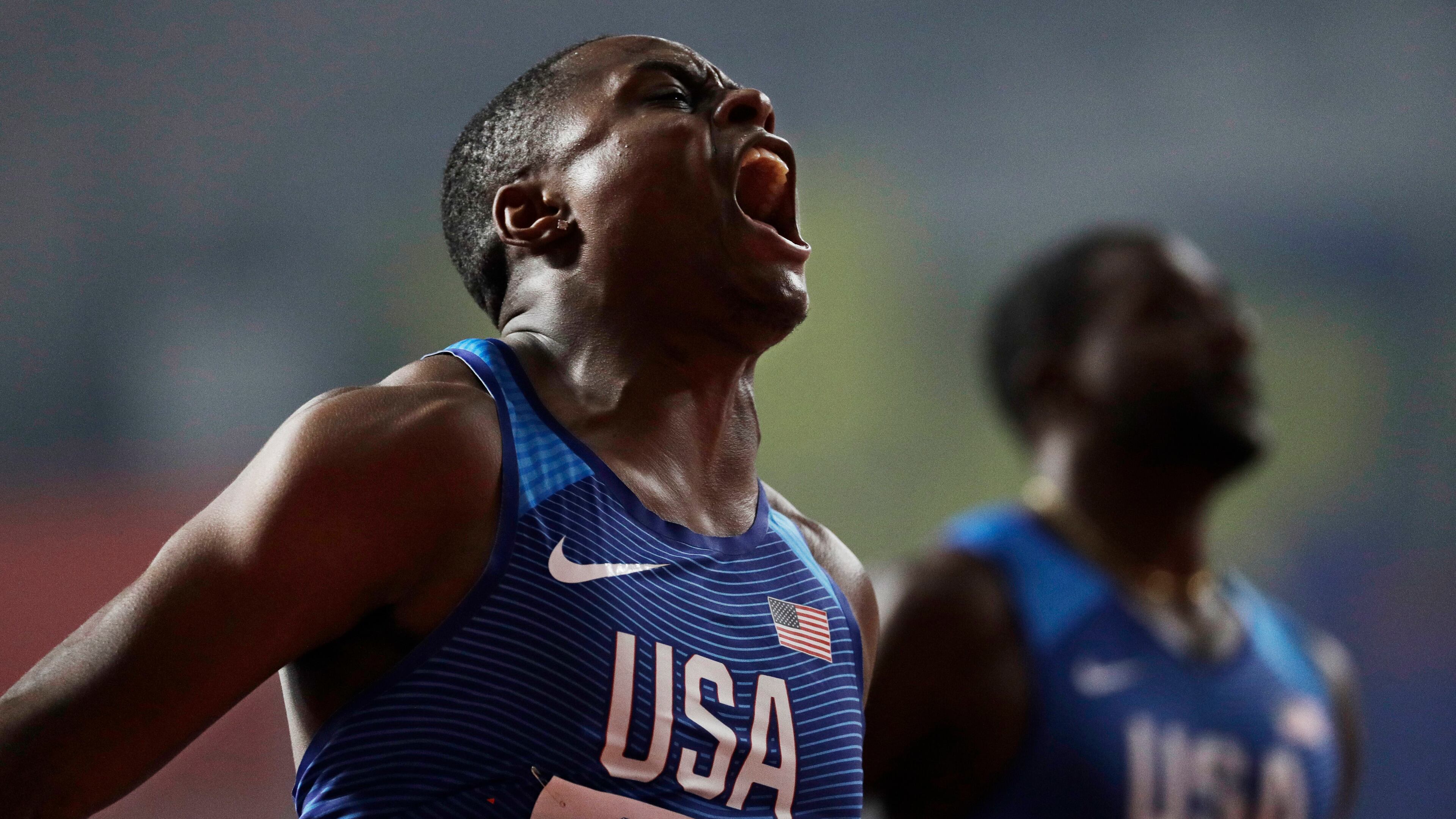 Atlanta's Christian Coleman is jubilant after winning the men's 100-meter final at last September's World Athletics Championships in Doha, Qatar. His Olympic moment has been put on hold. (AP Photo/Petr David Josek)