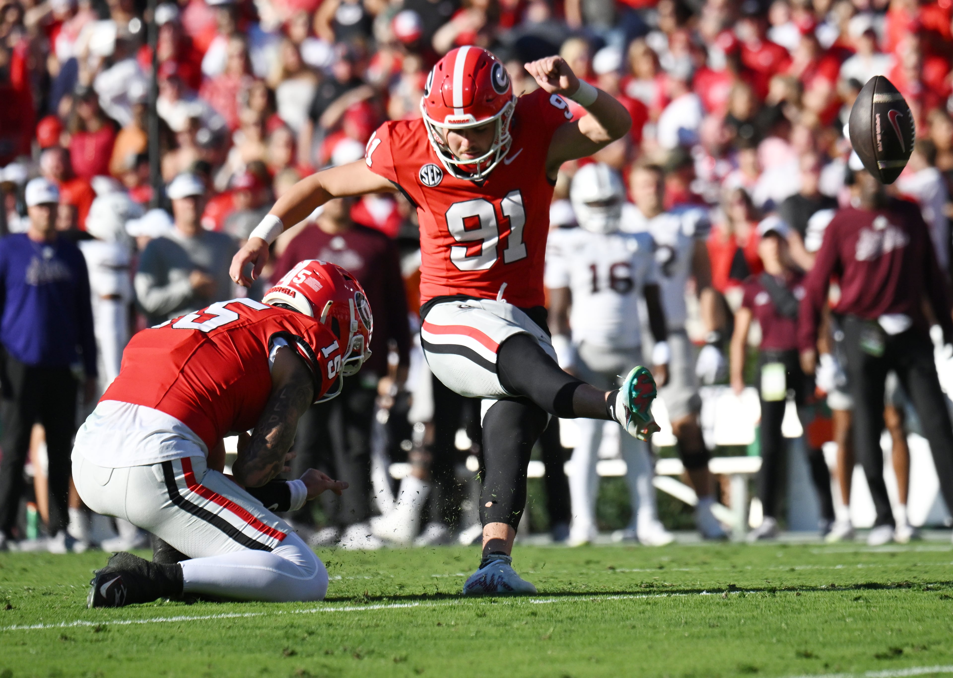 Georgia place kicker Peyton Woodring (91) hits a field goal during the first half in an NCAA football game at Sanford Stadium, Saturday, October 12, 2024, in Athens. Georgia won 41-31 over Mississippi State. (Hyosub Shin / AJC)