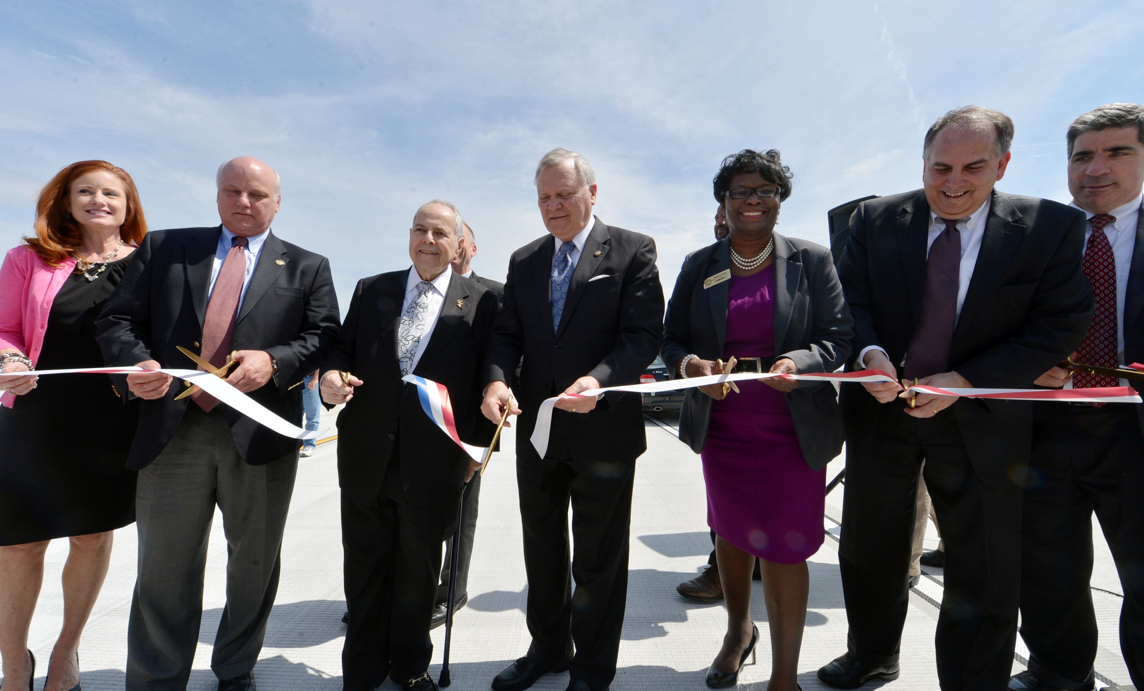 Governor Nathan Deal and other state and local leaders conducted a brief ribbon-cutting celebration of the opening of the new flyover ramps Wednesday, April 2, 2014. The ramps provide I-85 southbound traffic with direct access to GA 400 northbound and also give GA 400 southbound motorists a direct ramp to I-85 northbound.