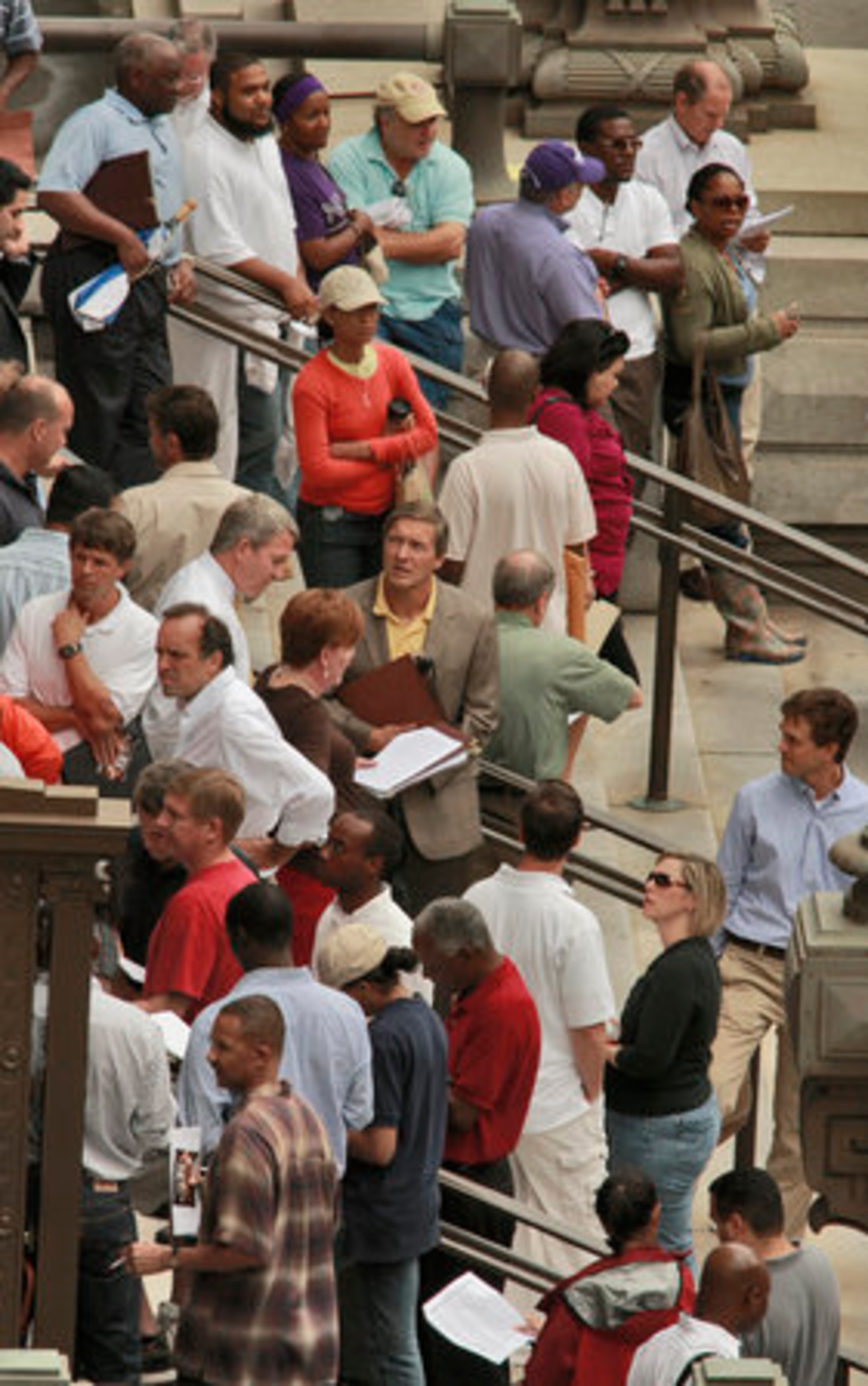 The Fulton County courthouse brought 70 delinquent tax lien sales before the public Tuesday on the courthouse steps as those property owners who defaulted on their taxes had their properties auctioned. More than 9,900 properties were on the auction block in 13 metro Atlanta counties, including Cobb, Fulton and Gwinnett.