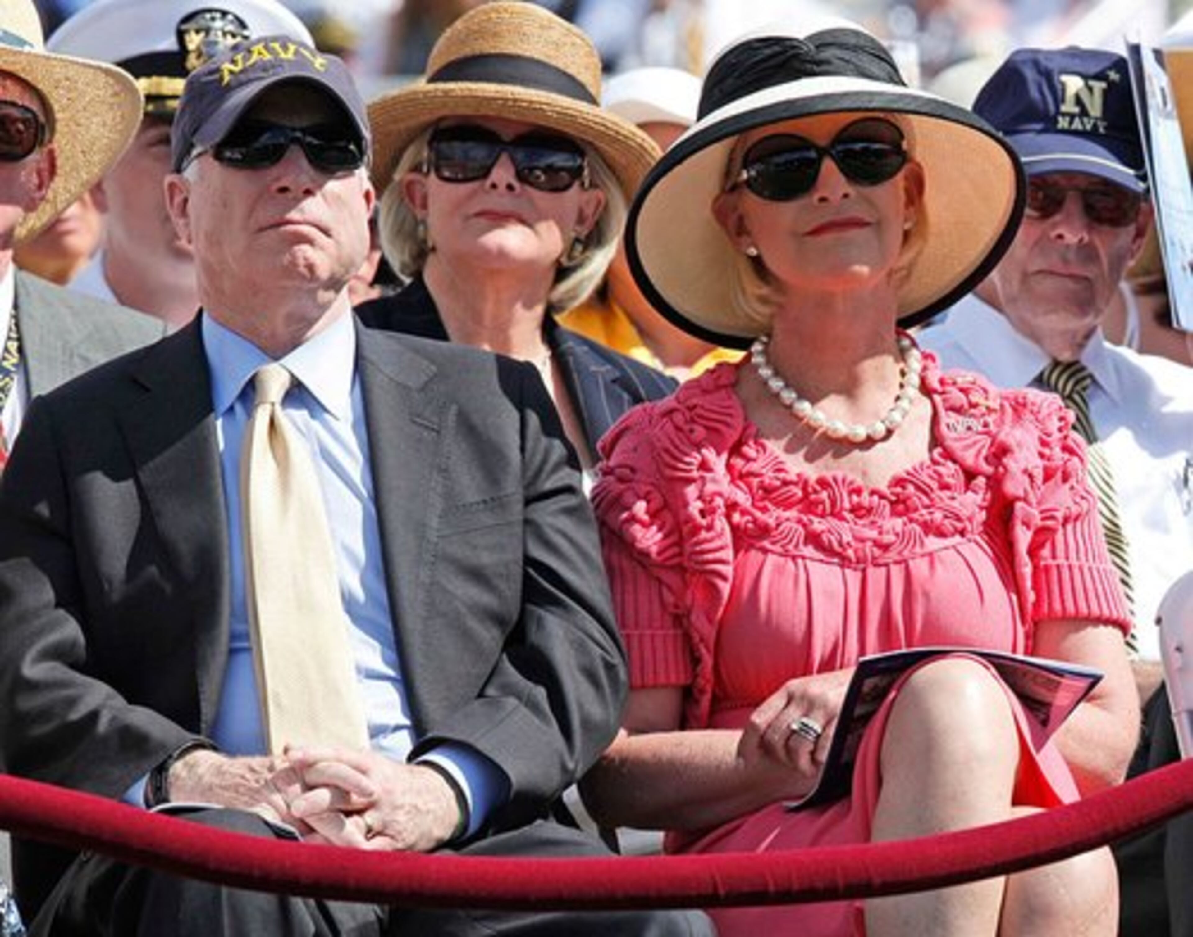 Sen. John McCain, R-Ariz., and his wife Cindy, whose son Jack is graduating, listens as President Barack Obama speaks.