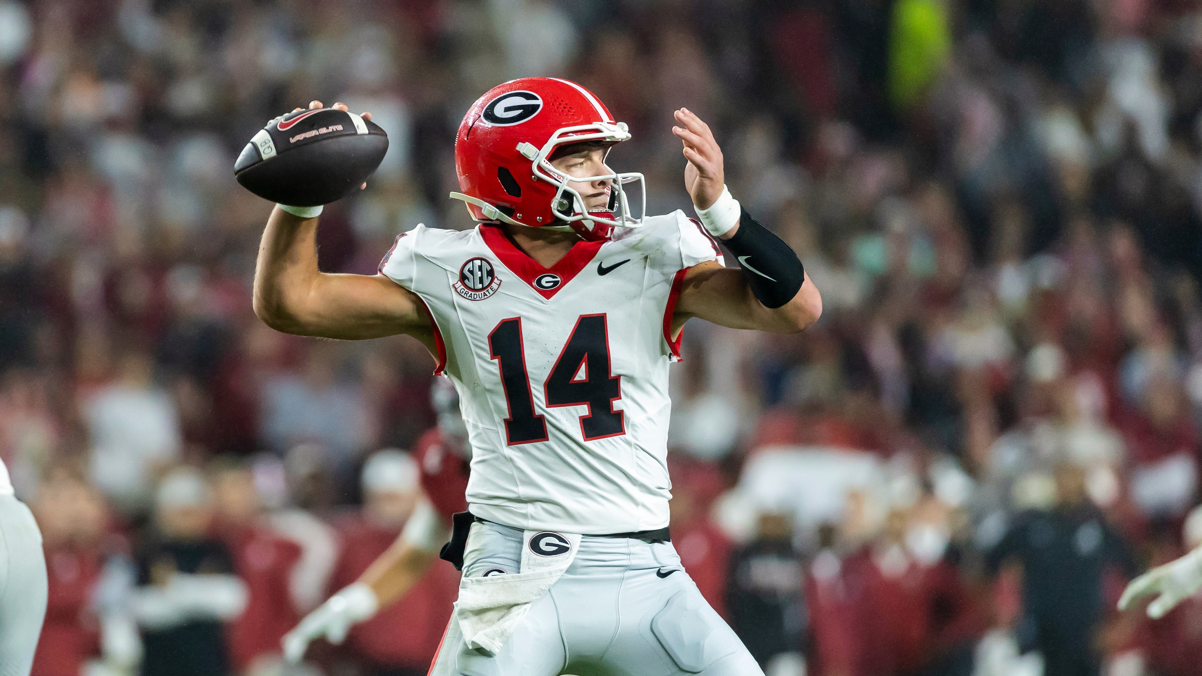 Georgia quarterback Gunner Stockton looks to throw the ball against Alabama during the first half of an NCAA college football game Saturday, Oct. 10, 2026, in Tuscaloosa, Ala. (AP Photo/Vasha Hunt)