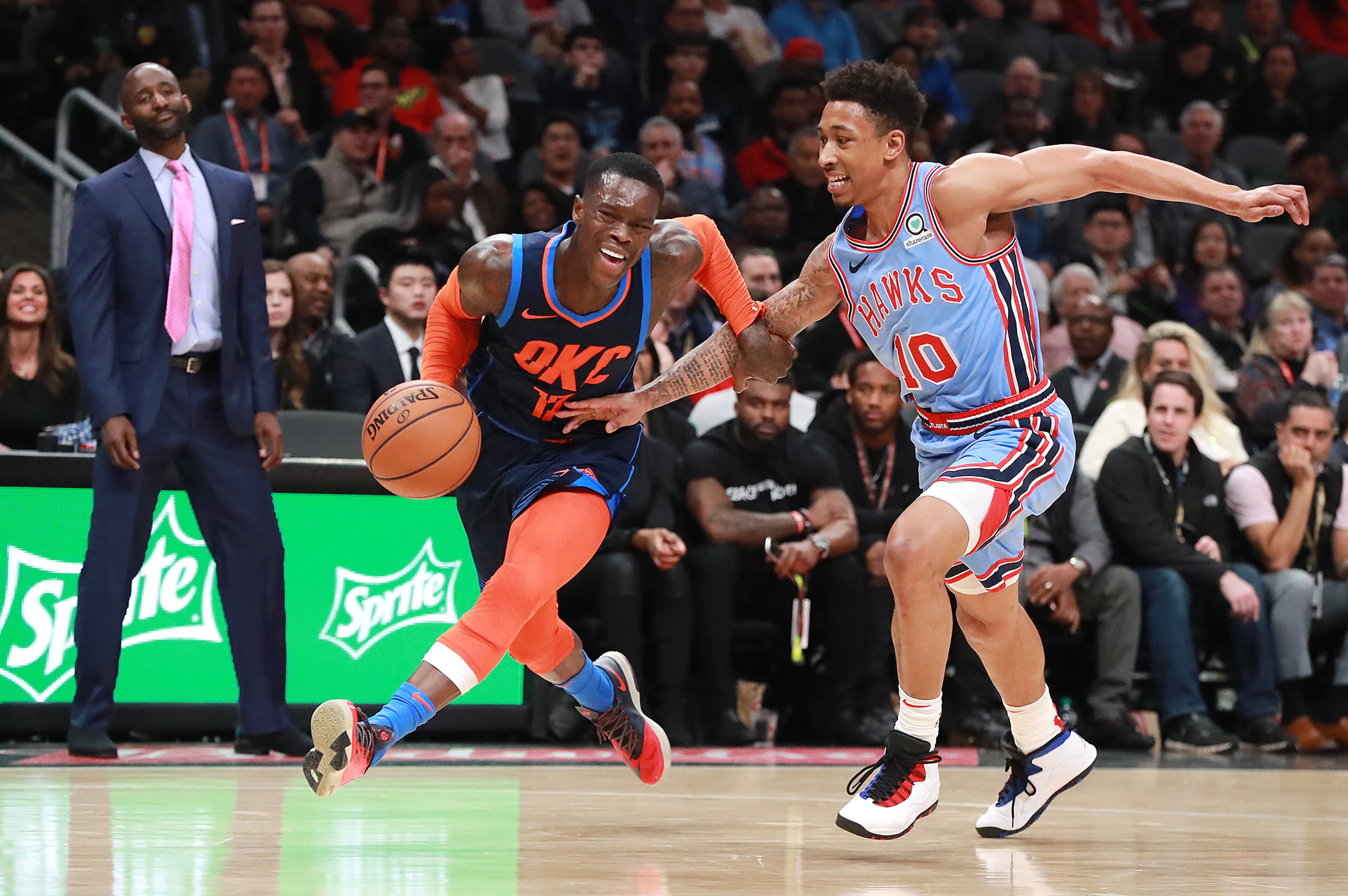 Jan. 15, 2019 Atlanta: Atlanta Hawks guard Jaylen Adams fouls Oklahoma City Thunder guard Dennis Schroder during the second half in a NBA basketball game on Tuesday, Jan. 15, 2019, at State Farm Arena in Atlanta. The Hawks beat the Thunder 142-126. Curtis Compton/ccompton@ajc.com