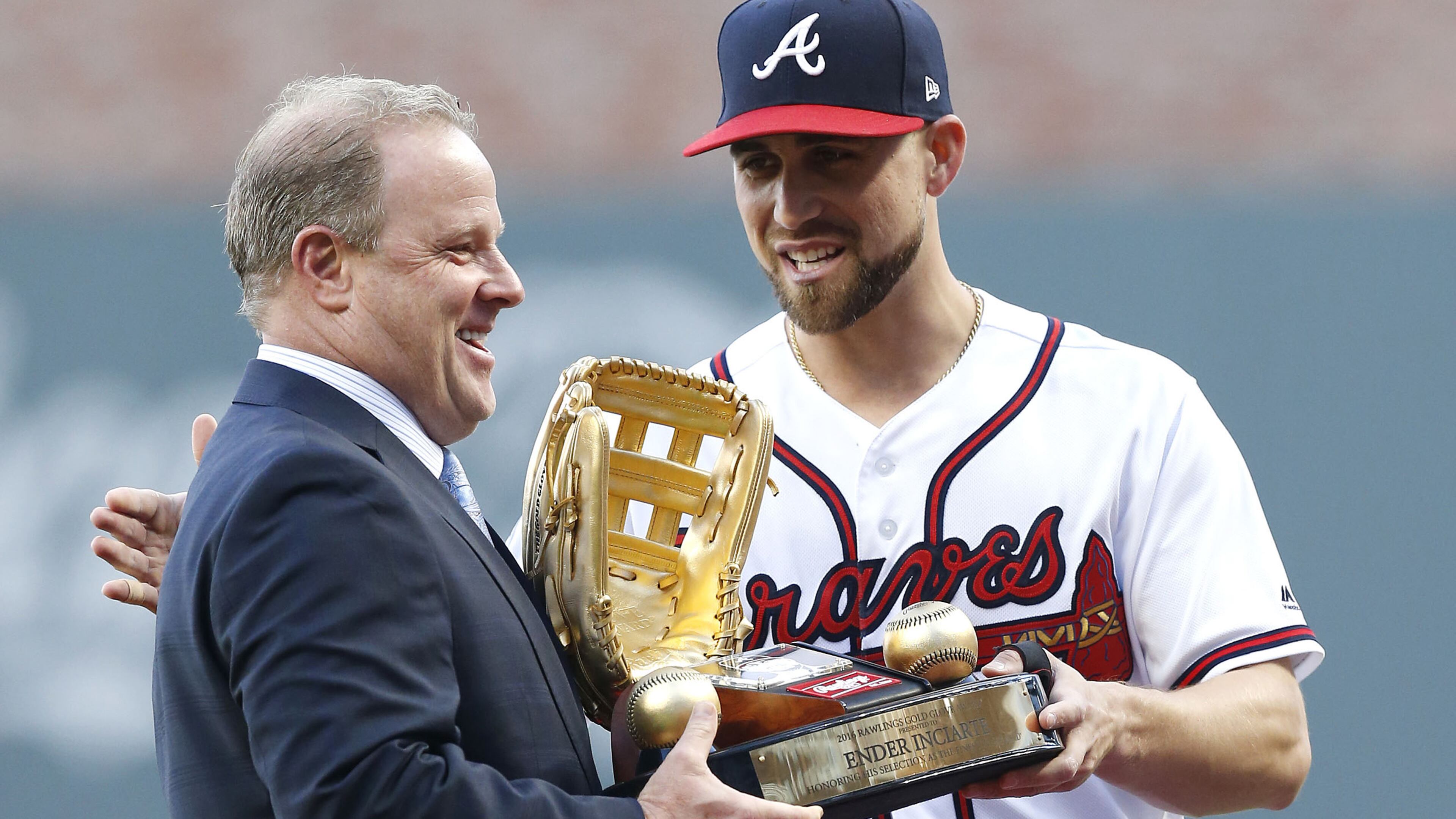 Braves center fielder Ender Inciarte is presented the Rawlings Gold Glove trophy before the game against the New York Mets at SunTrust Park on May 1, 2017 in Atlanta.