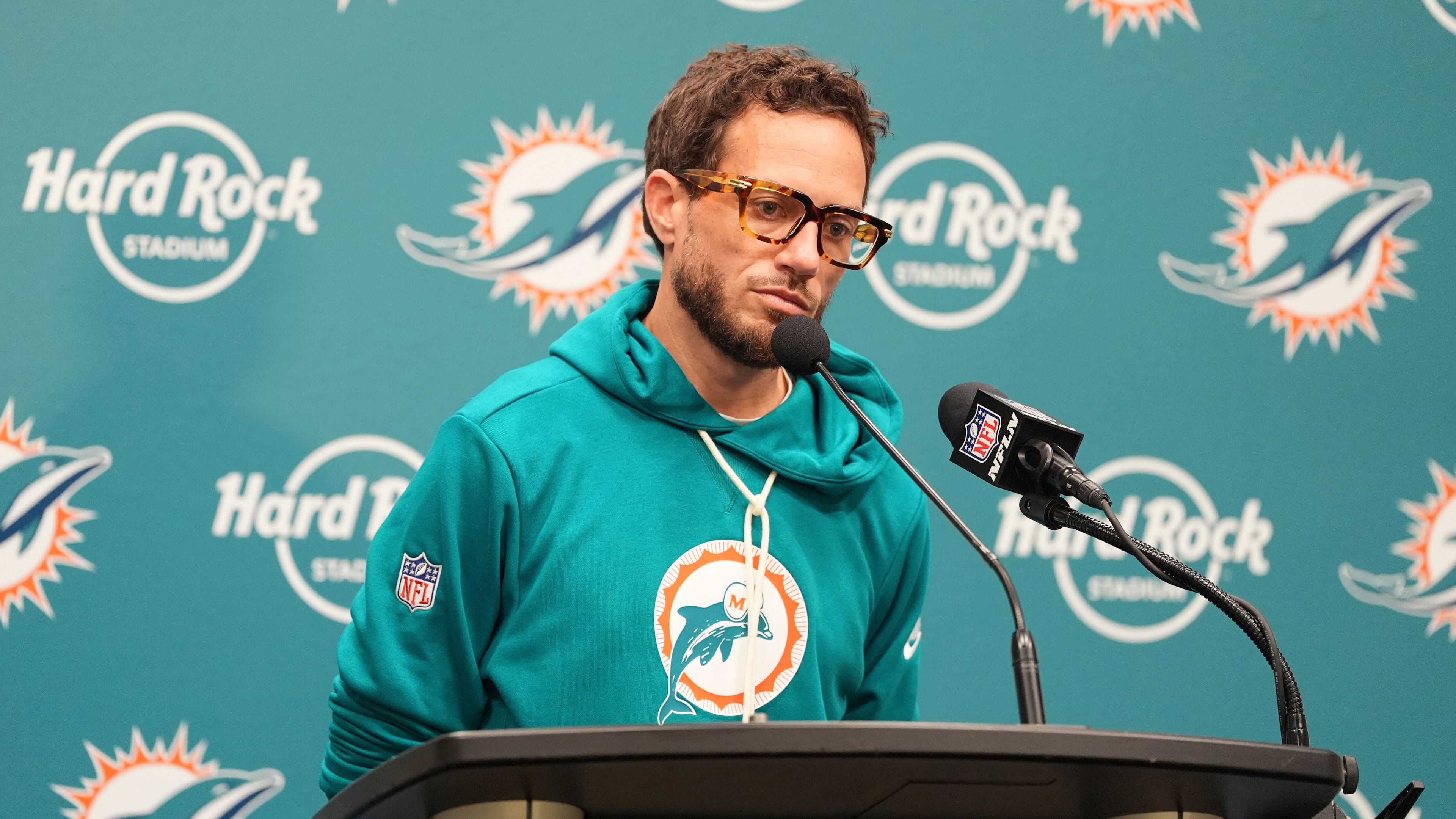 Miami Dolphins head coach Mike McDaniel ponders a question at news conference following a loss to the Cincinnati Bengals in an NFL football game, Sunday, Dec. 21, 2025, in Miami Gardens, Fla. (AP Photo/Rebecca Blackwell)