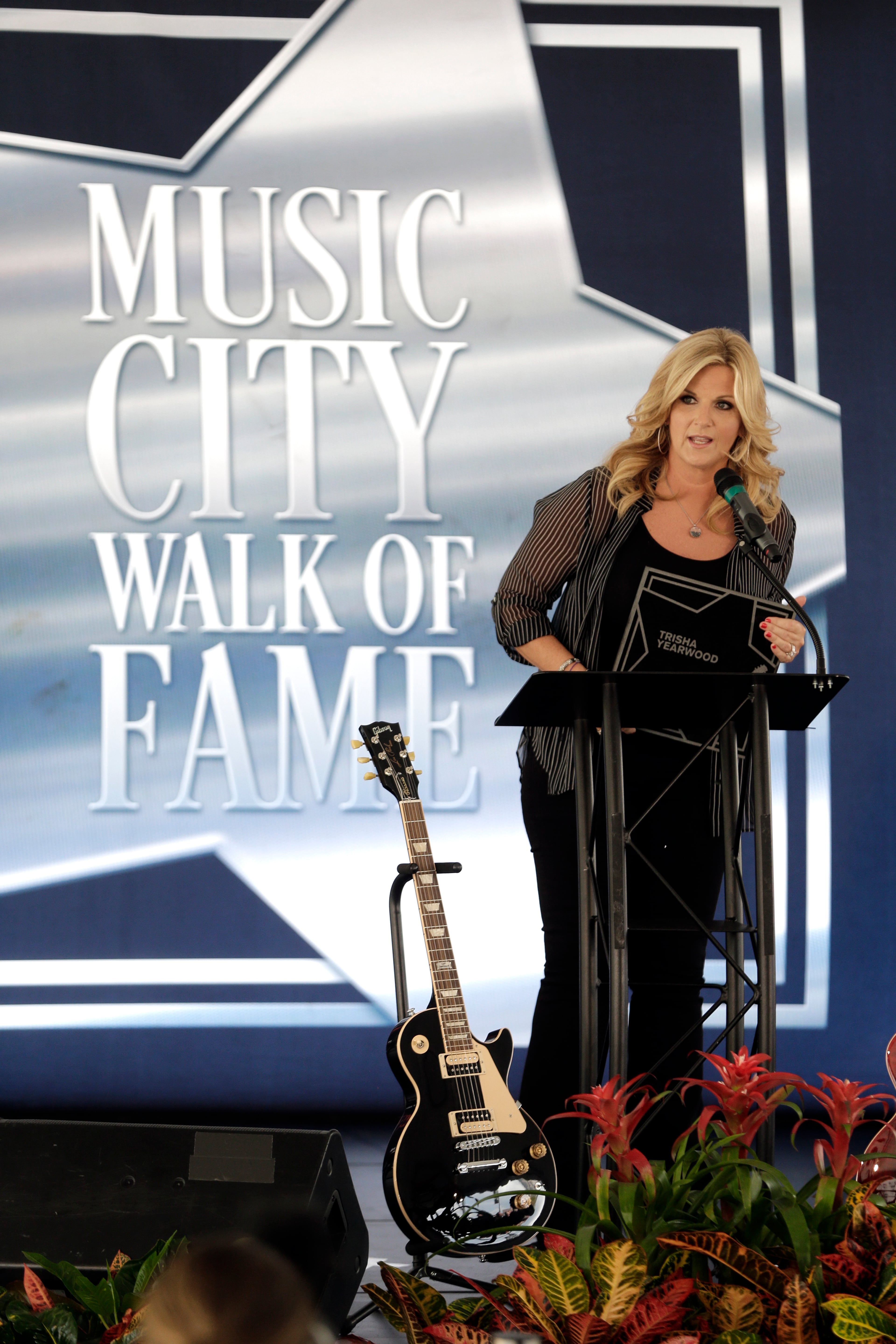 Trisha Yearwood speaks during a ceremony giving her a star on the Music City Walk of Fame on Thursday, Sept. 10, 2015, in Nashville, Tenn. (AP Photo/Mark Humphrey)