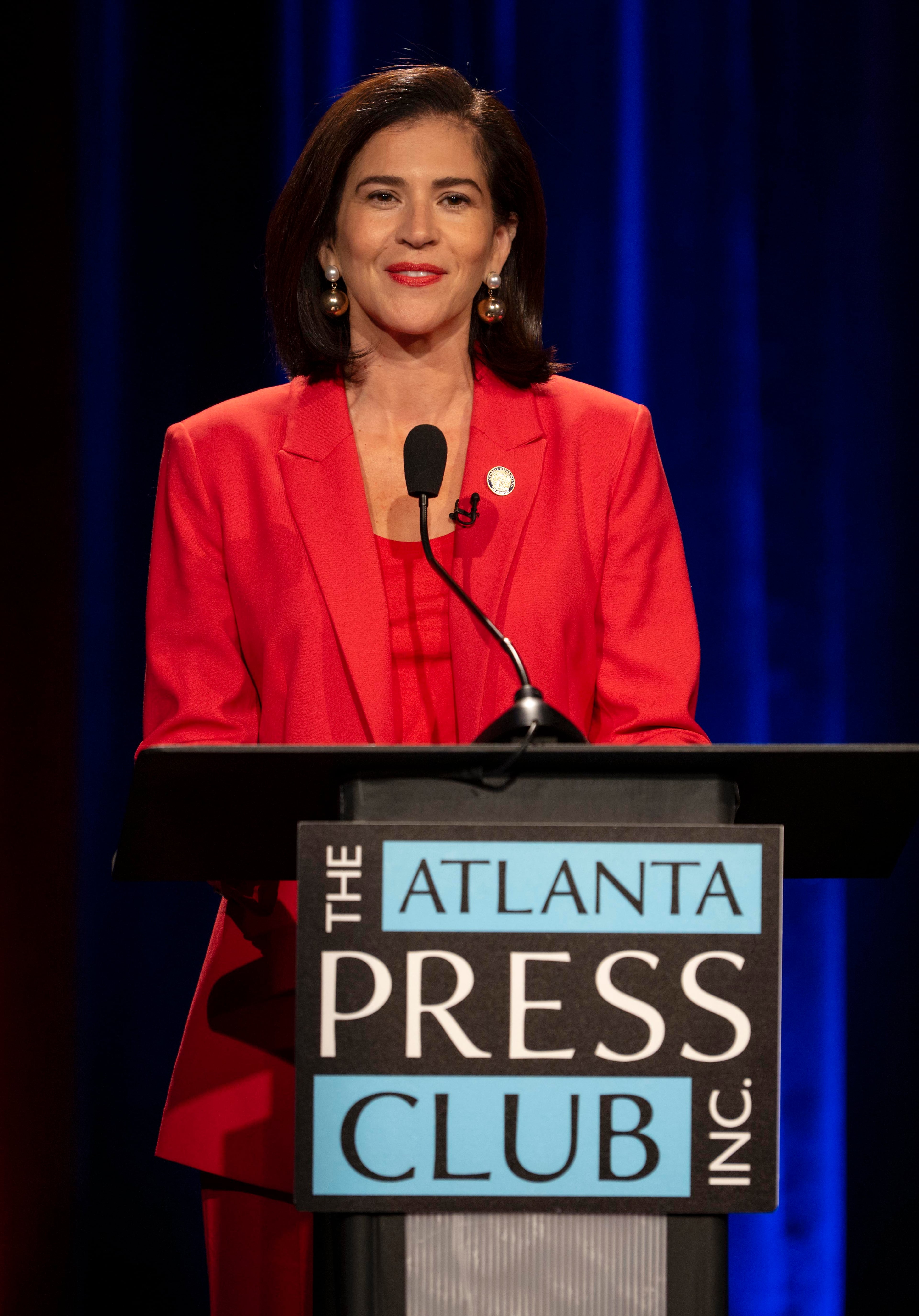Incumbent Republican Labor Commissioner Barbara Rivera Holmes debates Democratic candidate Nikki Porcher (not shown) at the Atlanta Press Club's Loudermilk-Young Debate Series held Tuesday, Oct. 13, at the studios of Georgia Public Broadcasting. (Pool photo by Brian Cahn)