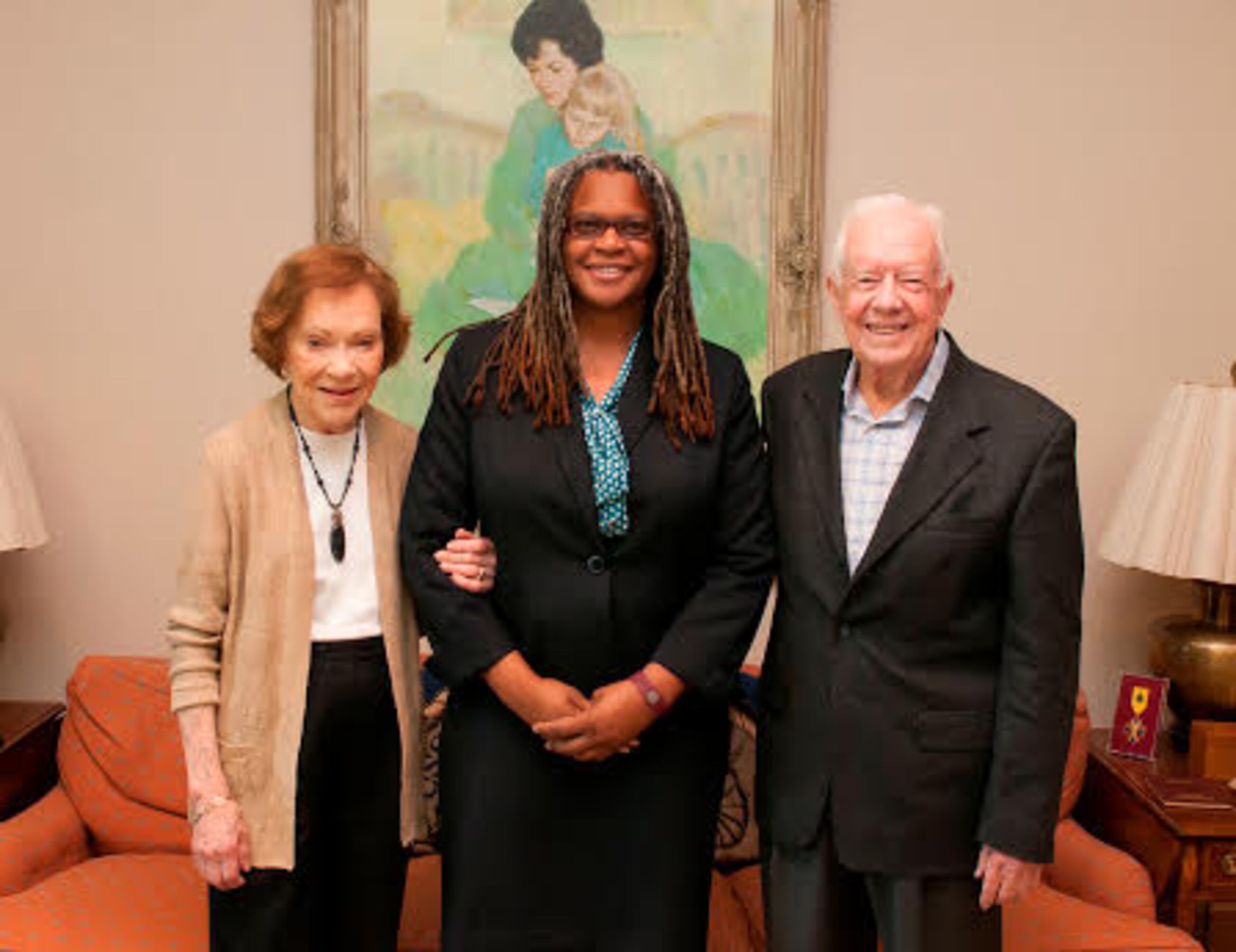 Meredith Evans, with President Jimmy Carter and Rosalynn Carter, is the director of the Jimmy Carter Presidential Library and Museum.