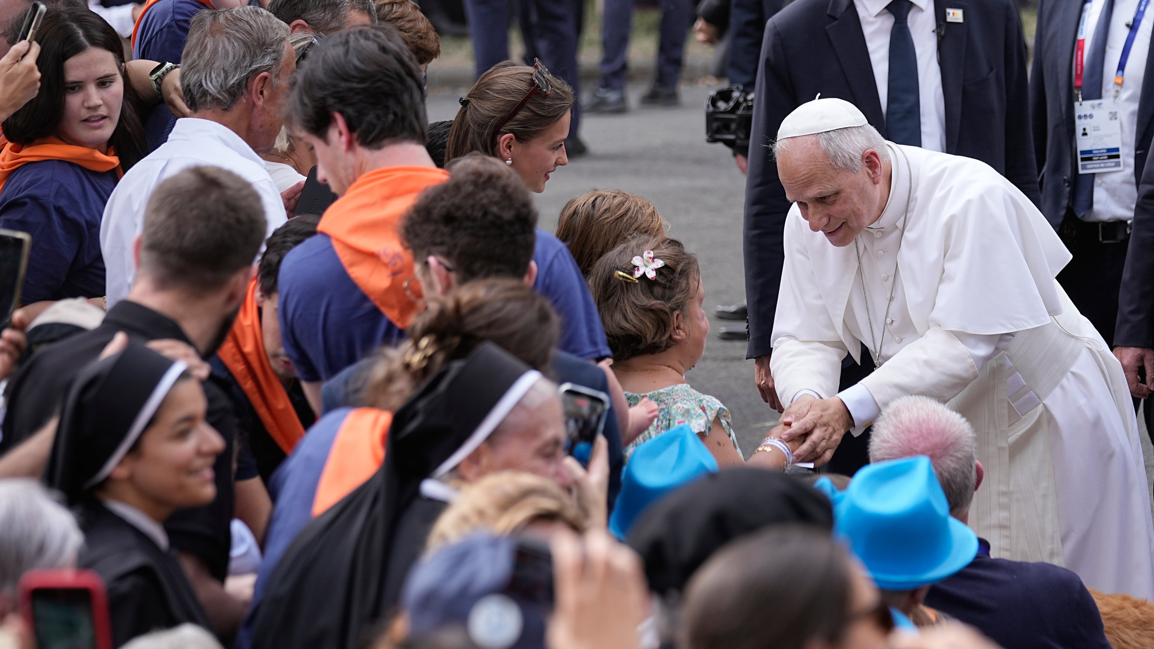 Pope Leo XIV meets with staff and guests of Accueil Notre-Dame and sick people at the Sanctuary of Our Lady of Lourdes, France, Sunday, Sept. 27, 2026. (AP Photo/Laurent Cipriani)
