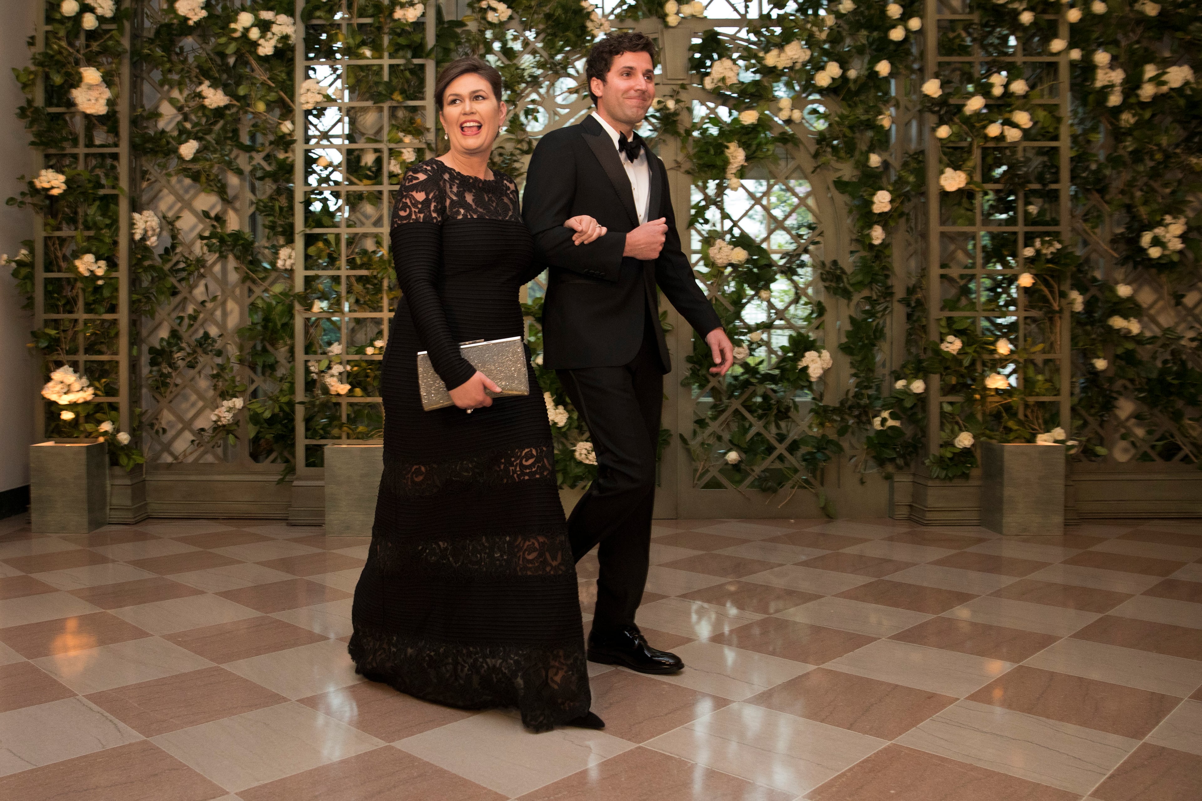 WASHINGTON, DC - APRIL 24: White House Press Secretary Sarah Sanders and her husband Bryan arrive at the White House for a state dinner April 24, 2018 in Washington, DC . President Donald Trump is hosting French President Emmanuel Macron for the first state visit of his presidency. (Photo by Aaron P. Bernstein/Getty Images)