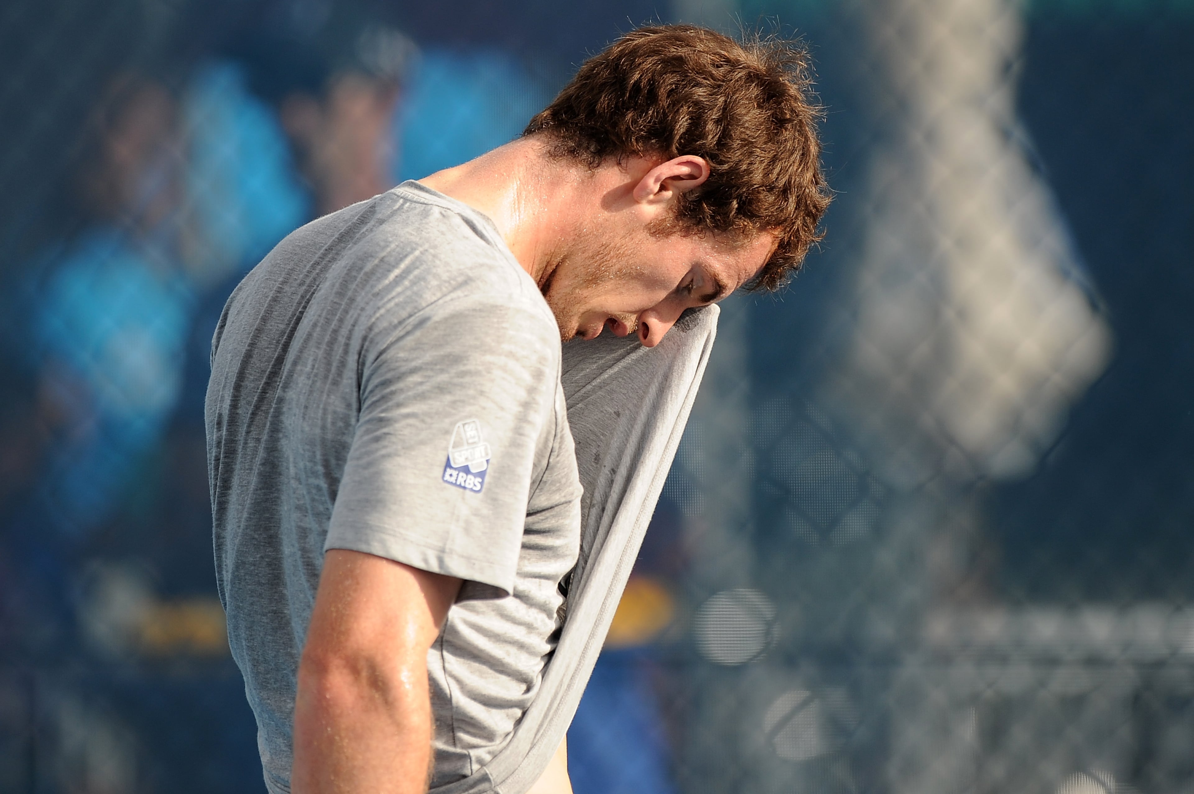 BRISBANE, AUSTRALIA - DECEMBER 31: Andy Murray of Great Britain sweat off his face during a practice session on day two of the Brisbane International at Pat Rafter Arena on December 31, 2012 in Brisbane, Australia. (Photo by Matt Roberts/Getty Images)