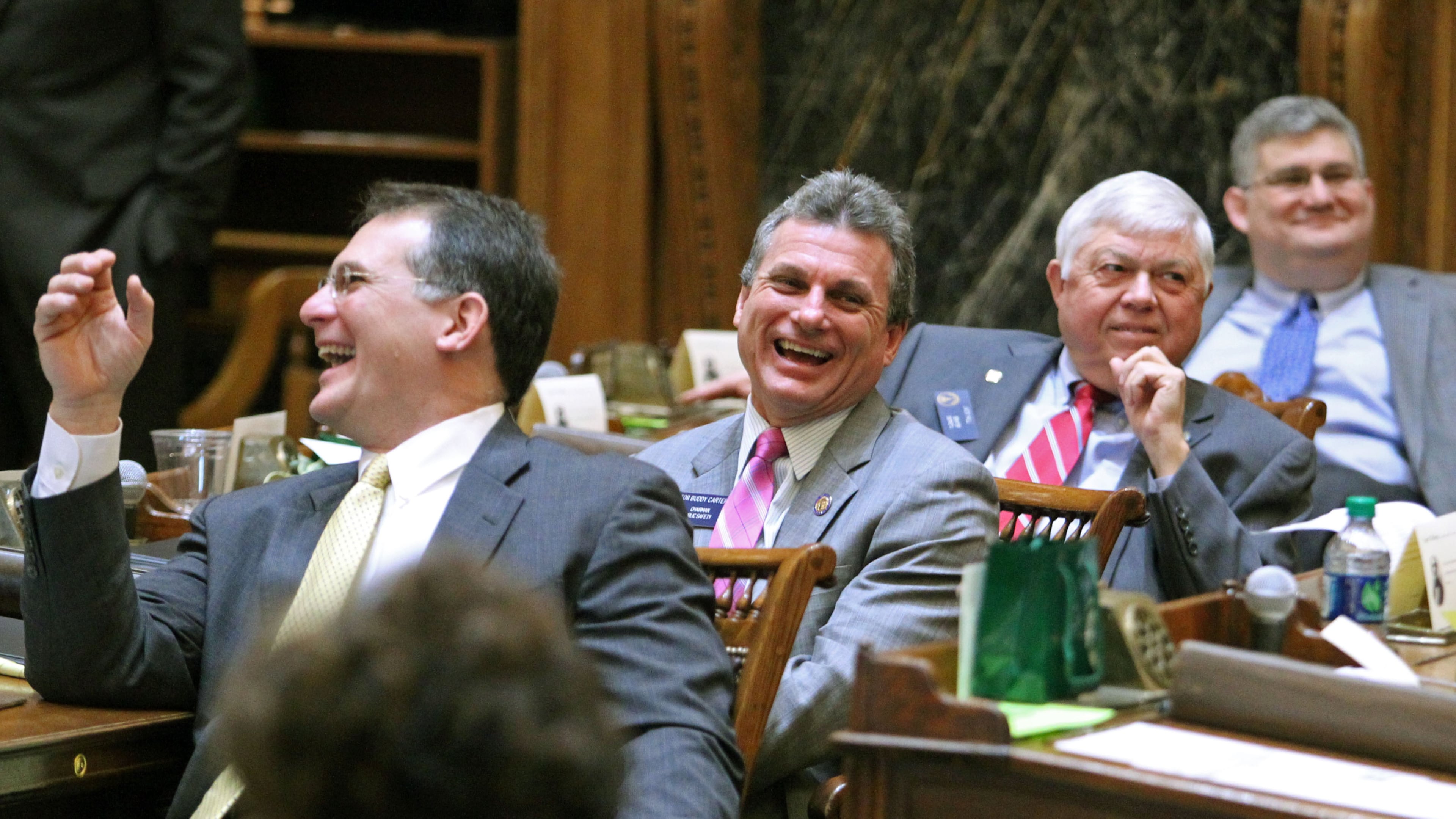 Buddy Carter, second from left, in 2013. JASON GETZ / JGETZ@AJC.COM