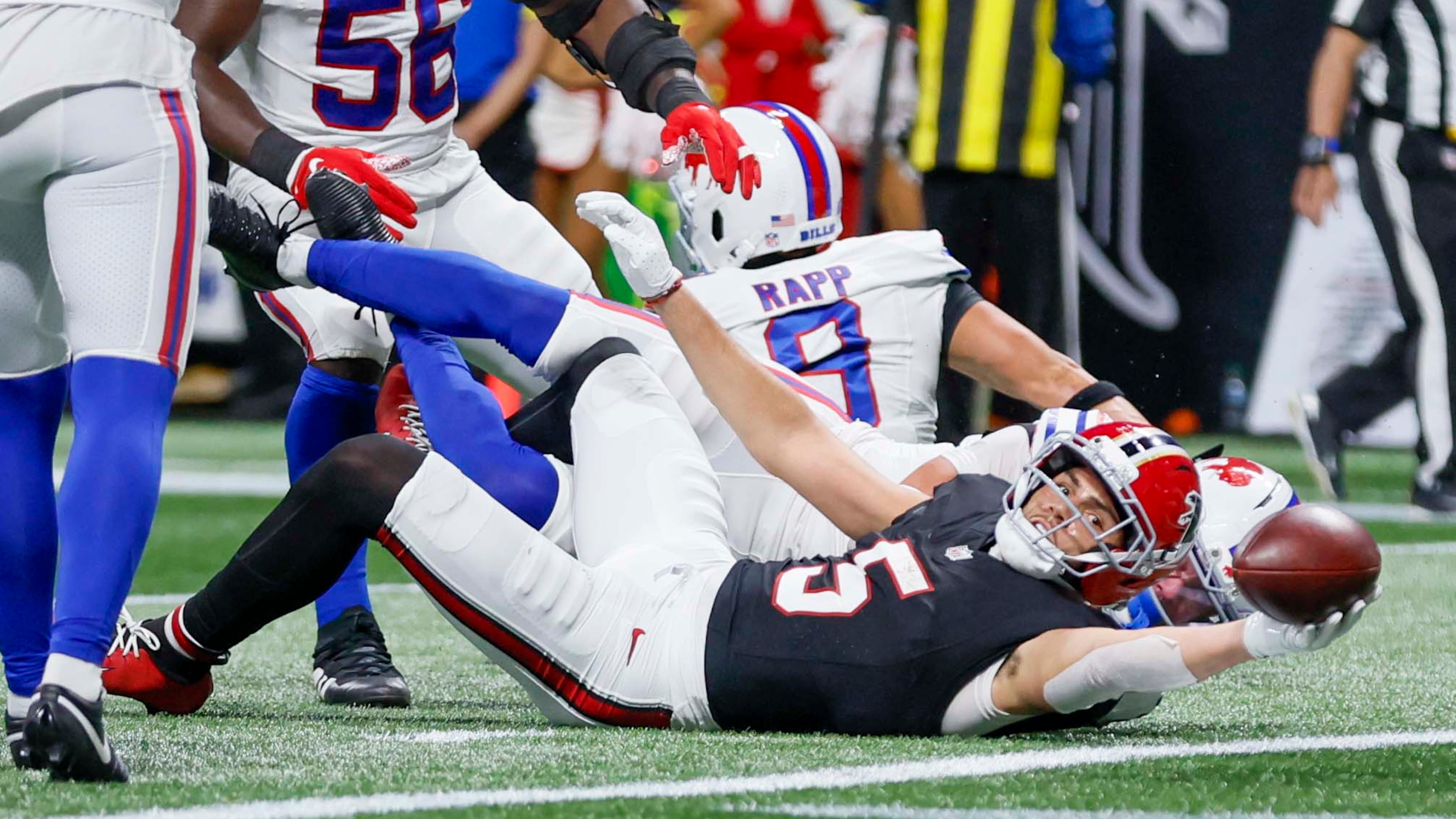 Atlanta Falcons wide receiver Drake London scores a touchdown during the first half of an NFL game against the Buffalo Bills at Mercedes-Benz Stadium in Atlanta on Monday, Oct. 13, 2025. (Miguel Martinez/AJC)
