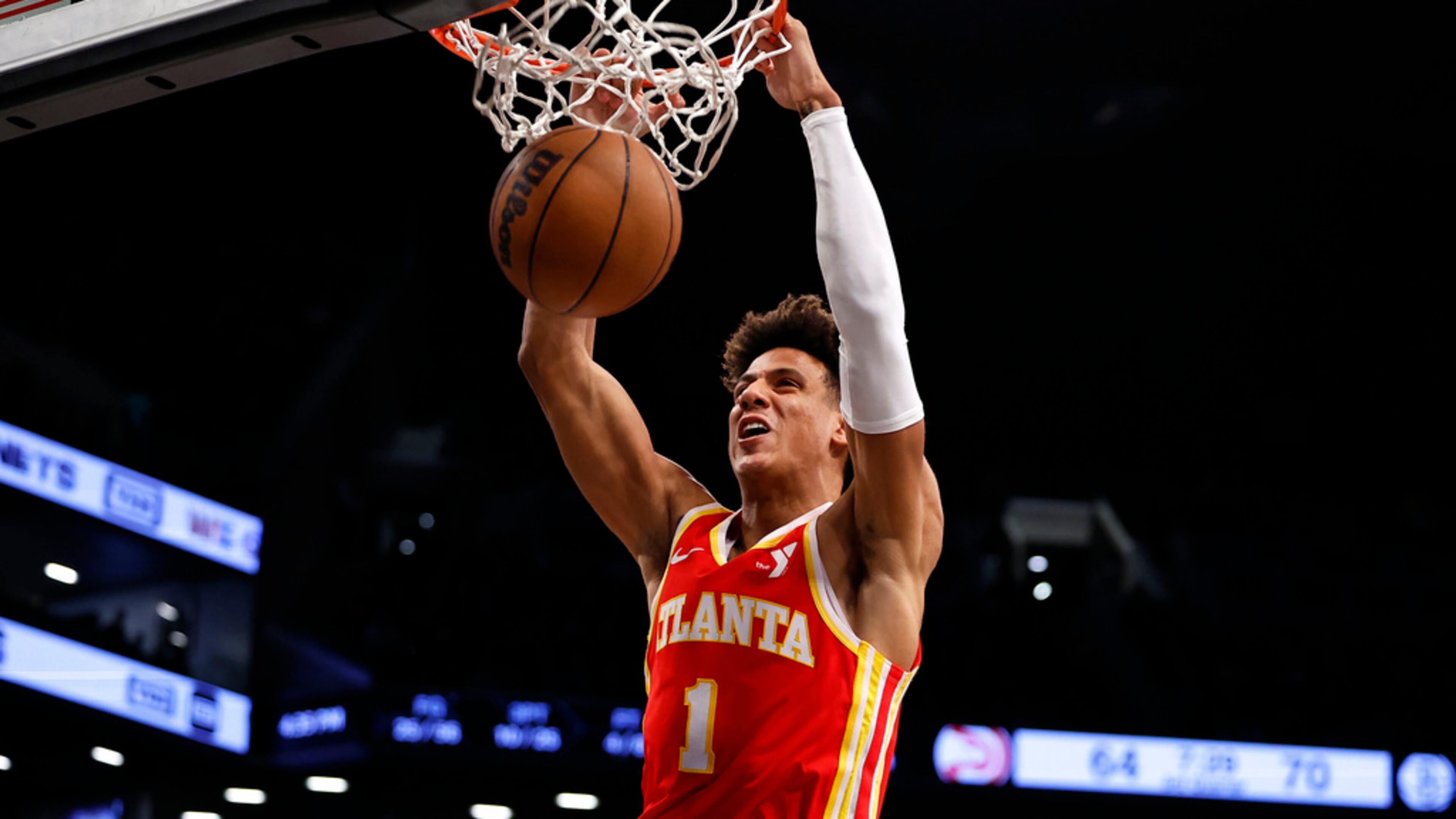 Hawks forward Jalen Johnson dunks against the Brooklyn Nets during the second half of an NBA basketball game, Saturday, March 2, 2024, in New York. (AP Photo/Noah K. Murray)