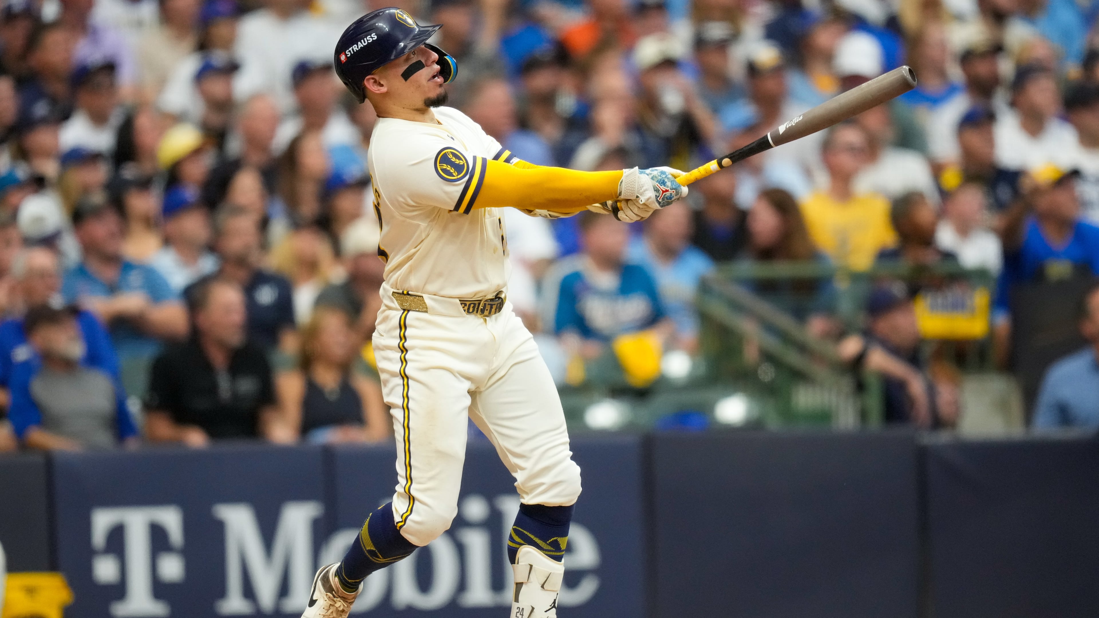 Milwaukee Brewers catcher William Contreras follows through on his solo home run during the fifth inning of Game 2 of baseball's National League Championship Series between the Milwaukee Brewers and the Los Angeles Dodgers, Monday, Oct. 12, 2026, in Milwaukee. (AP Photo/Ashley Landis)