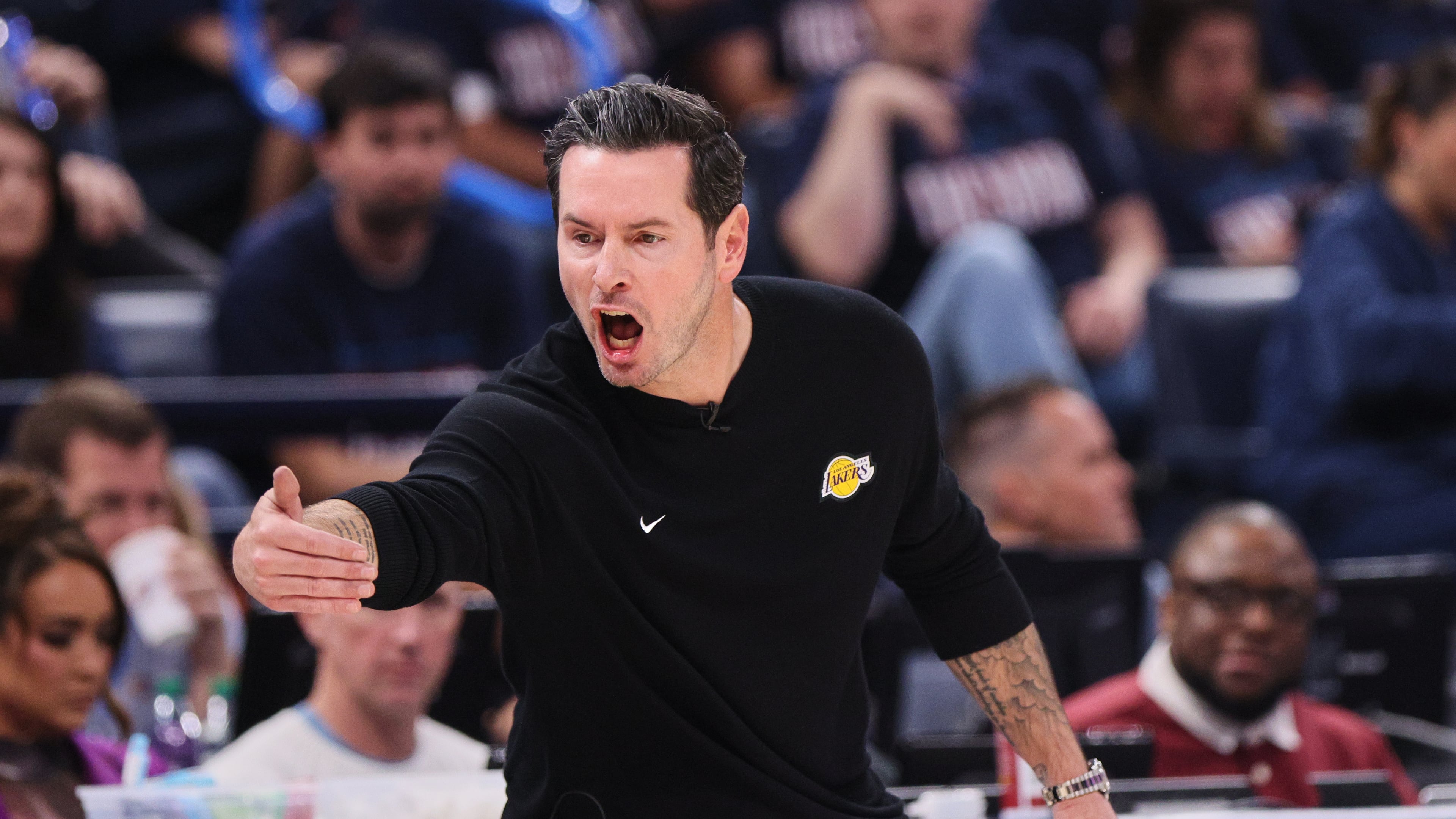 Los Angeles Lakers head coach JJ Redick reacts to play against the Oklahoma City Thunder in the second half of Game 2 in a second-round NBA basketball playoffs series Thursday, May 7, 2026, in Oklahoma City. (AP Photo/Nate Billings)