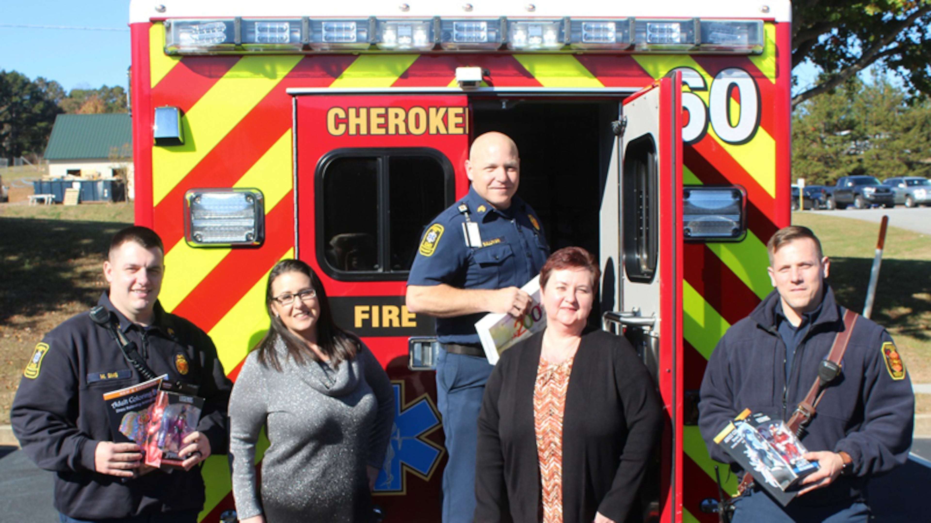 Helping to “Stuff a Squad” with gifts to benefit the Goshen Valley Boys Ranch are (from left) Cherokee County Sgt. Michael Sims, event coordinator Leslie Sullivan, Sgt. Nate Sullivan, Viktoriya Dubovis with Chart Industries, and Firefighter Trevor Newberry. CHEROKEE COUNTY FIRE & EMERGENCY SERVICES