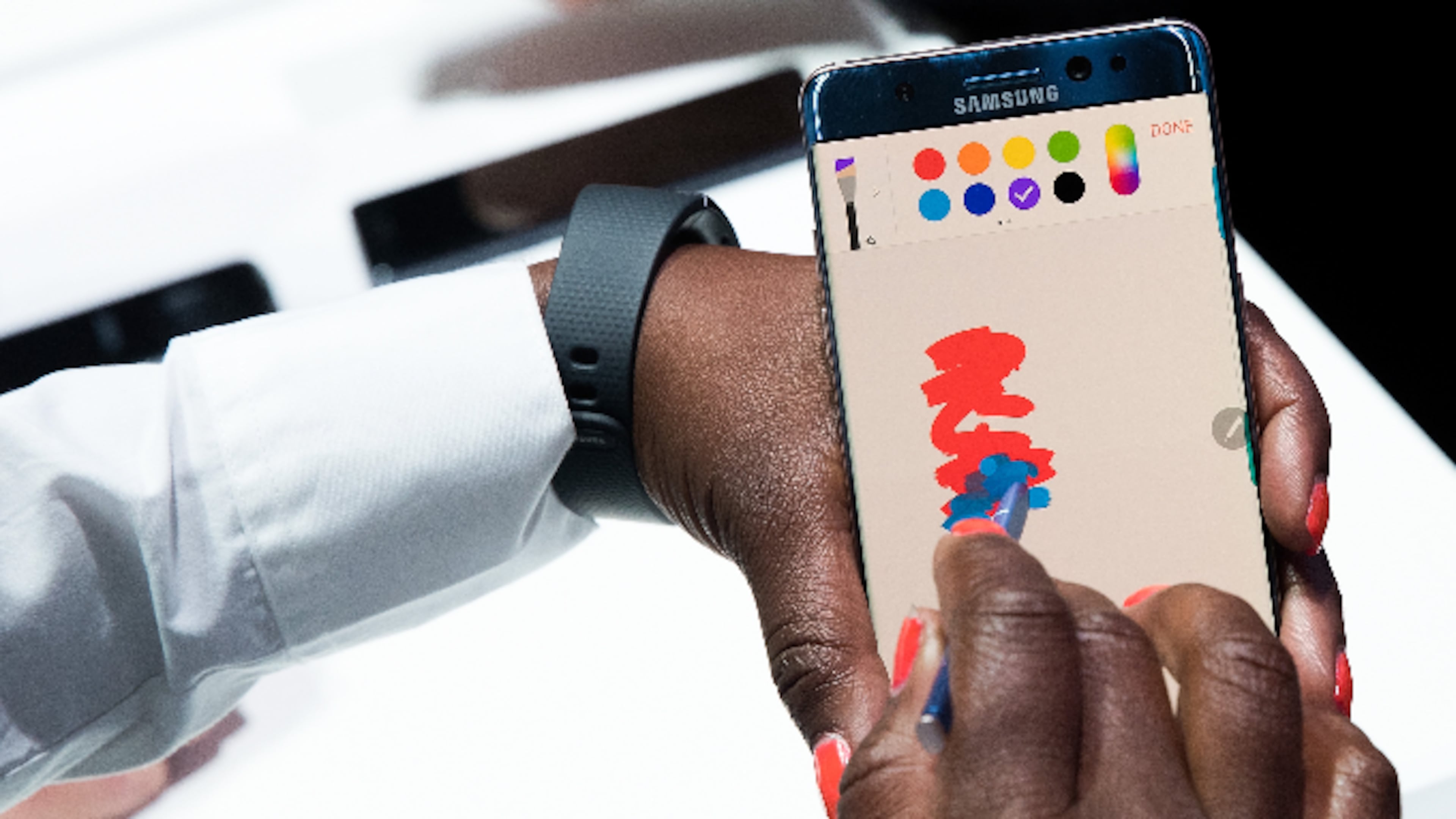 A Samsung employee uses a stylus on a Samsung Galaxy Note 7 smartphone during a launch event for the Samsung Galaxy Note 7 in New York City.