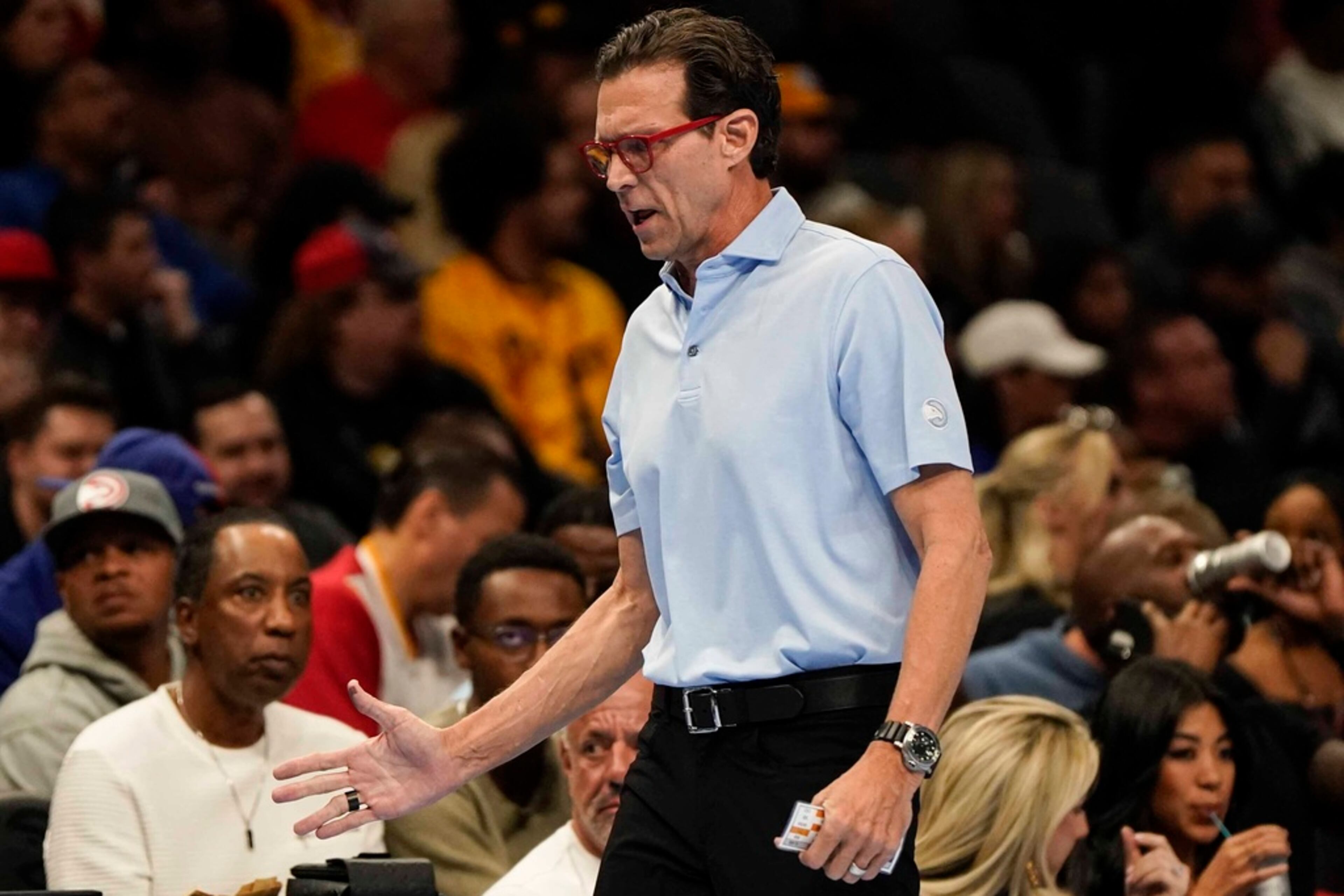Atlanta Hawks head coach Quin Snyder heads to the bench during the first half of an In-Season Tournament NBA basketball game against the Philadelphia 76ers, Friday, Nov. 17, 2023, in Atlanta. (AP Photo/Mike Stewart)