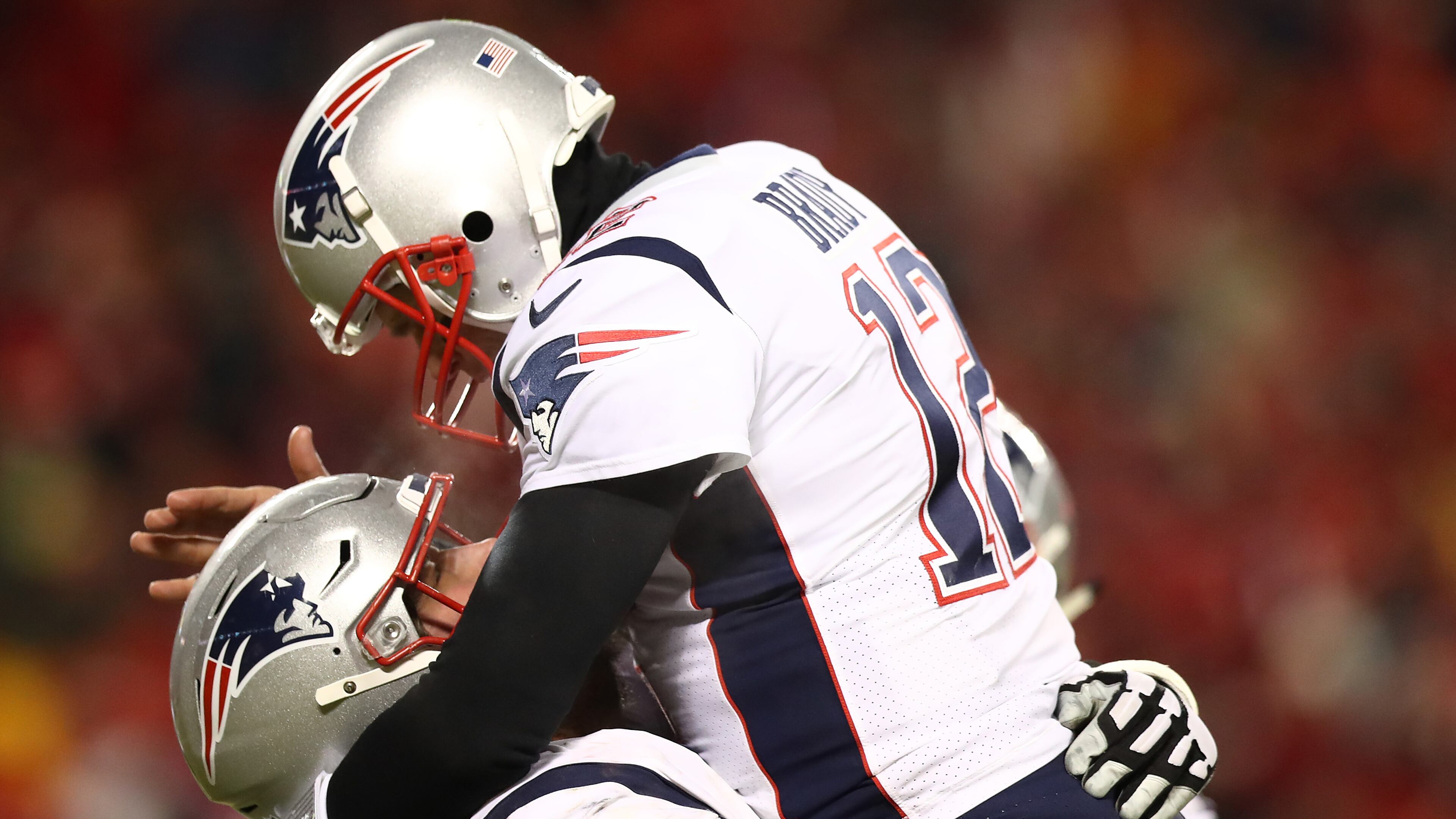 New England quarterback Tom Brady celebrates his second-quarter touchdown pass against Kansas City in the AFC Championship.