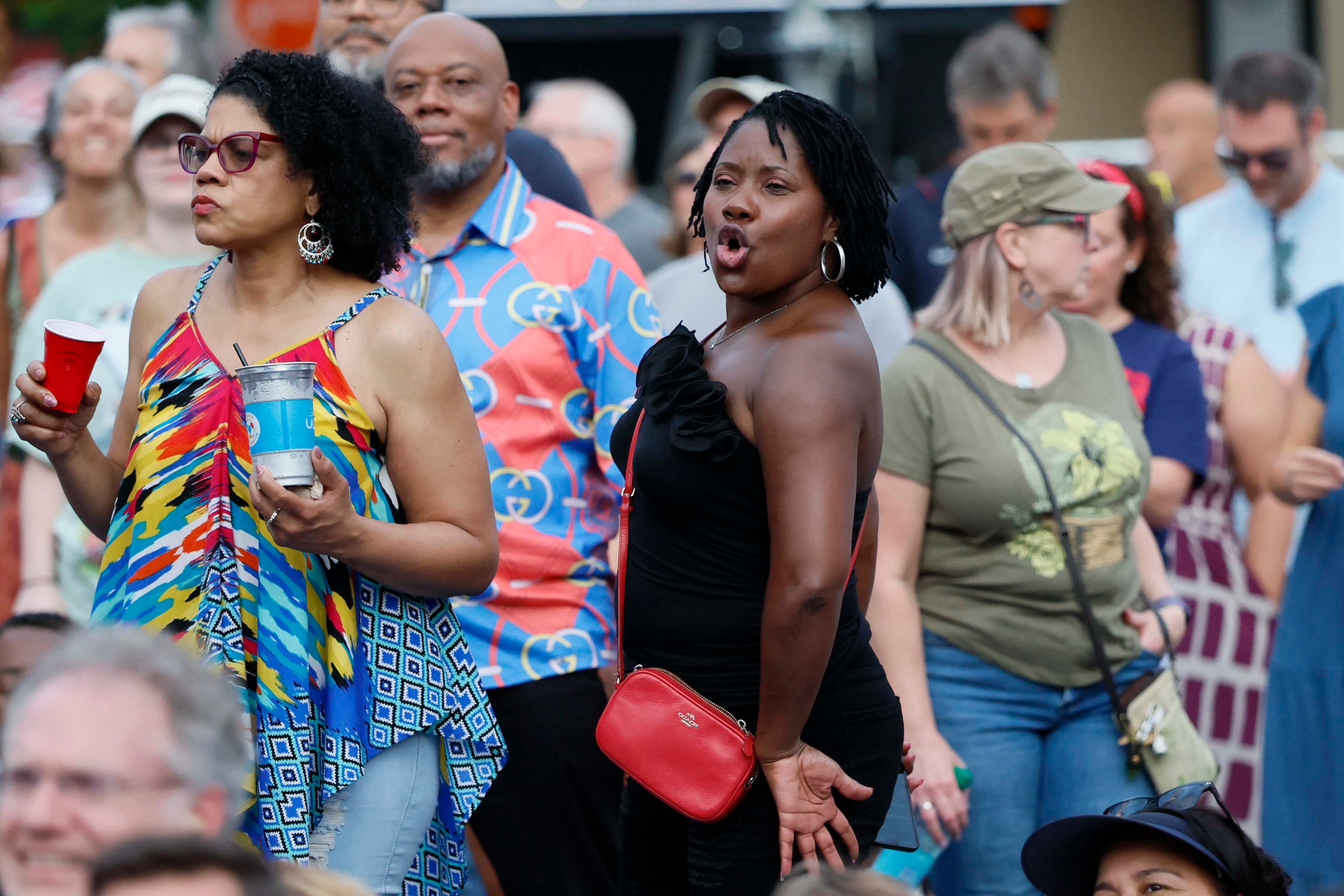Festivalgoers dance as the War and Treaty performs during Decatur WatchFest ’26 on Thursday, June 25, 2026. (Miguel Martinez/AJC)