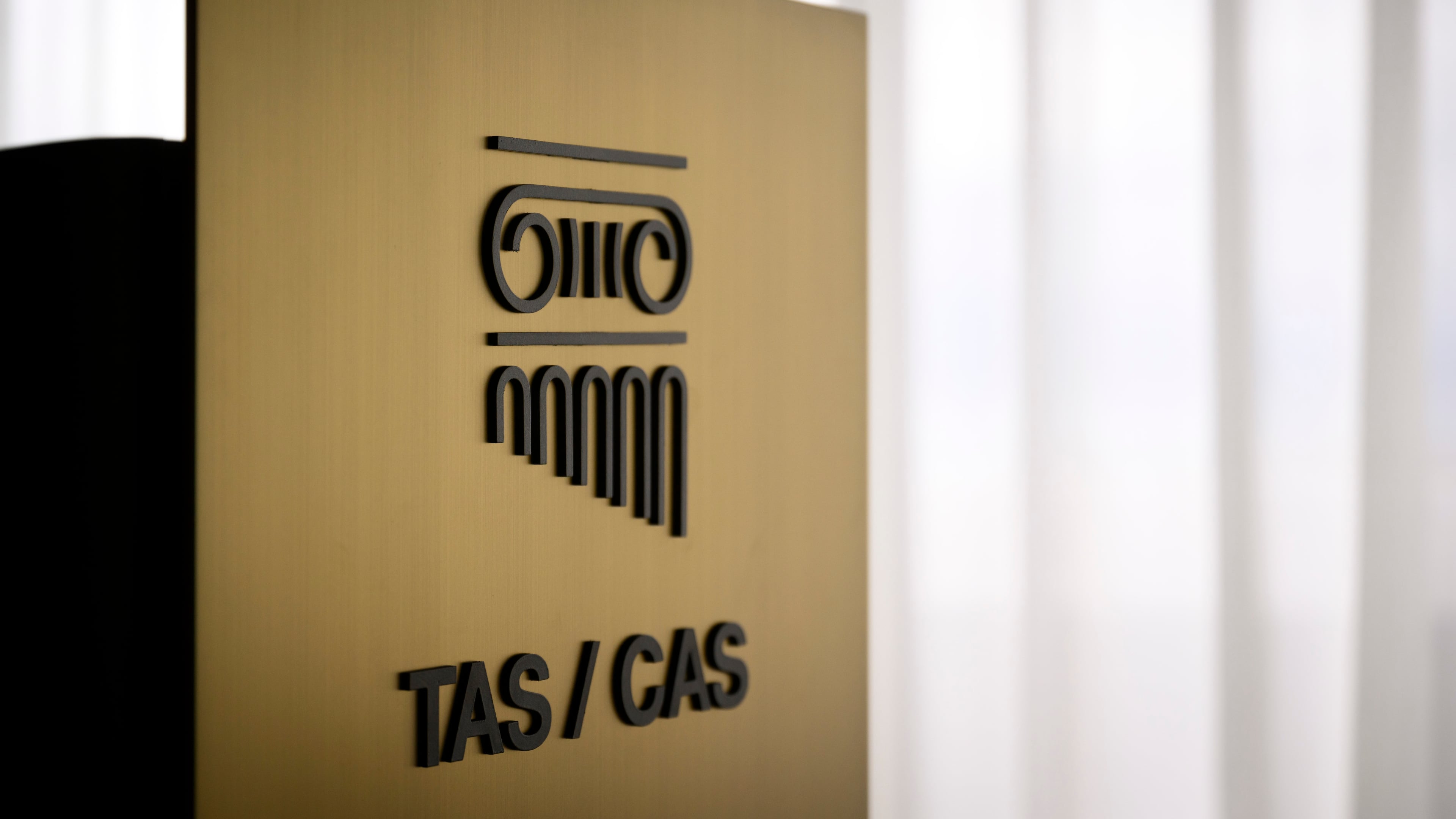 FILE - A TAS/CAS logo is pictured during the inauguration of the new headquarters of the international Court of Arbitration for Sport, CAS, at the Palais de Beaulieu in Lausanne, Switzerland, Monday, June 27, 2022. (Laurent Gillieron/Keystone via AP, File)