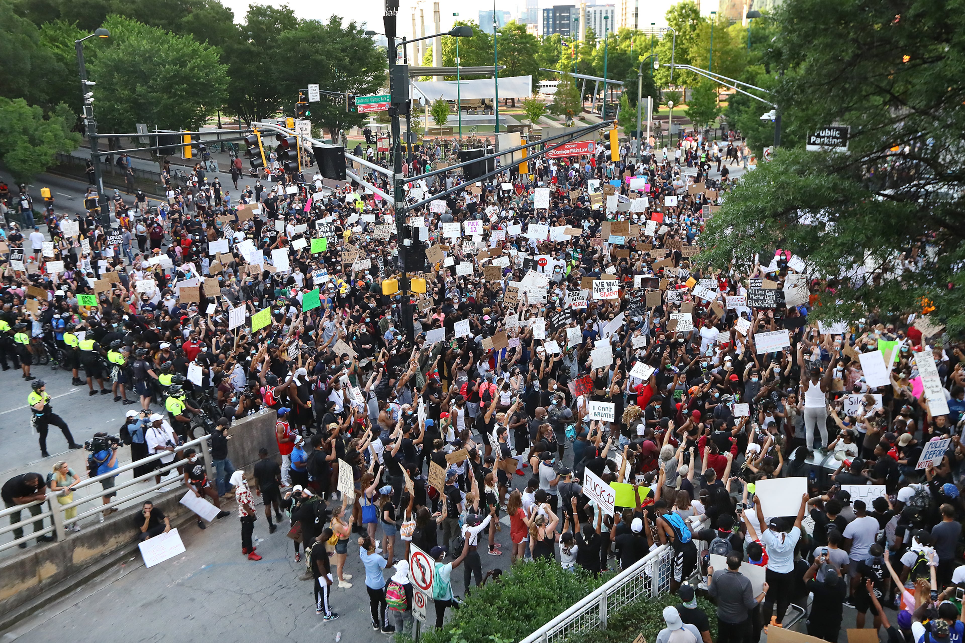 060220 Atlanta: More than 2000 protesters fill Marietta Street at Centennial Olympic Park Drive outside the CNN Center at Olympic Park during a fifth day of protests over the death of George Floyd on Tuesday, June 2, 2020, in Atlanta. Curtis Compton ccompton@ajc.com