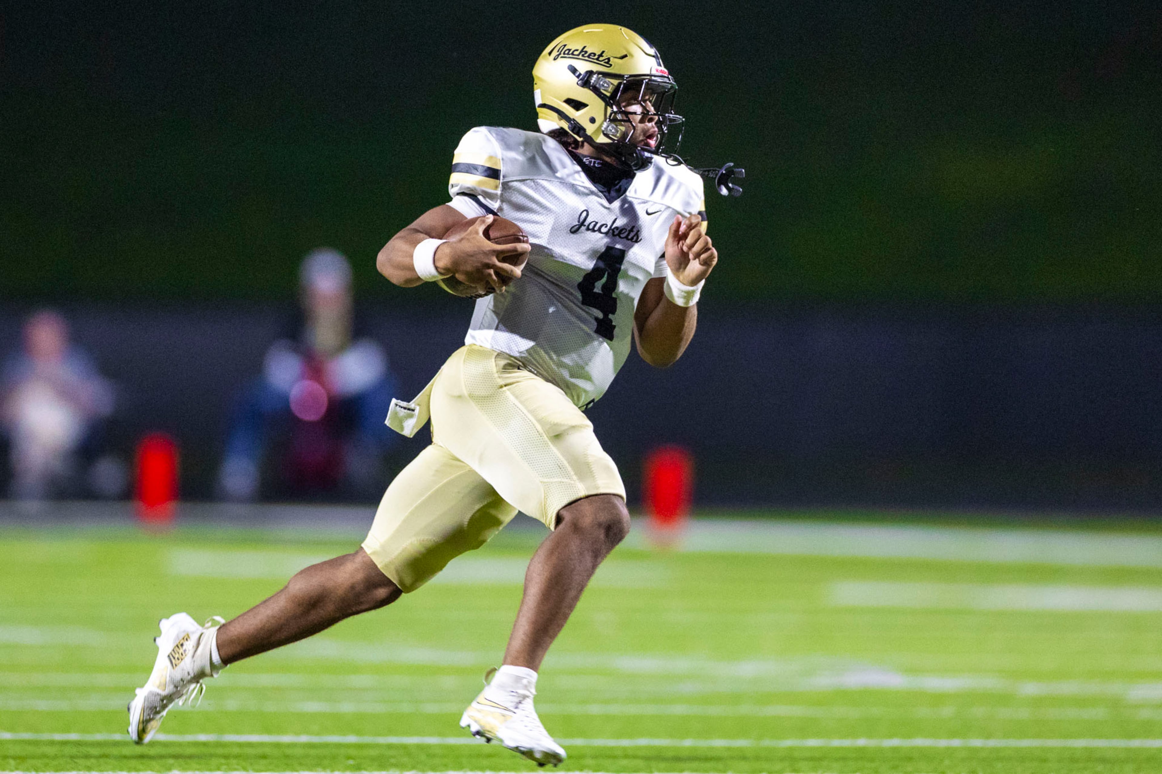Sprayberry quarterback Jaden Duckett runs the ball during the first half against Sequoyah on Friday. (Oscar Guevara Saenz for the AJC)