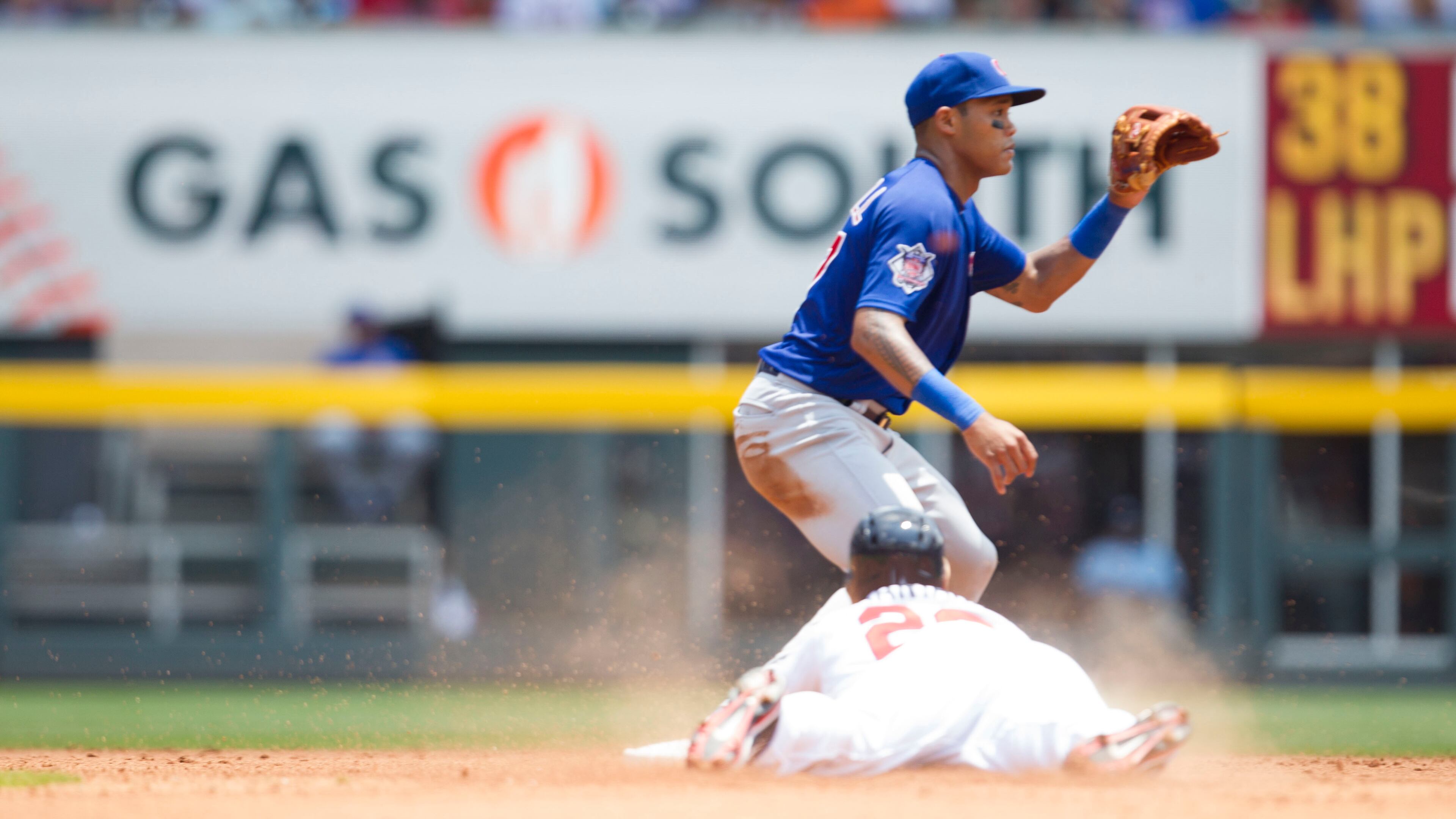 A Braves player slide into second base against the Chicago Cubs on July 19, 2017. Chad Rhym/Chad.Rhym@ajc.com