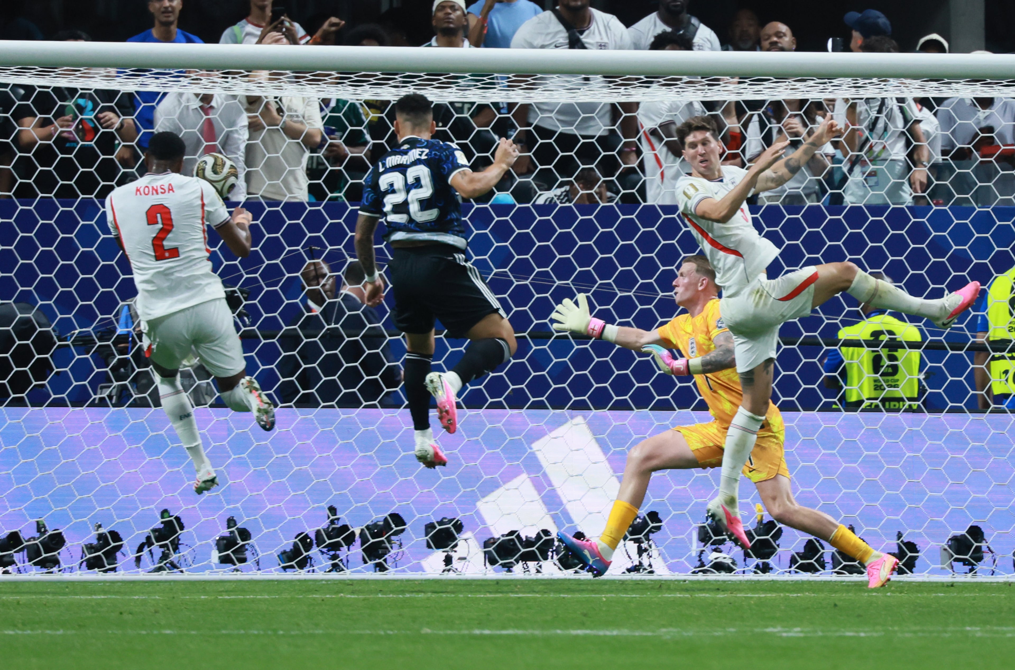Argentina's Lautaro Martinez (22) heads the ball past England goalkeeper Jordan Pickford for the winning goal during second half of Argentina vs. England FIFA World Cup Semifinal match at Atlanta Stadium (Mercedes-Benz Stadium) on Wednesday, July 15, 2026. (Jason Getz/AJC)