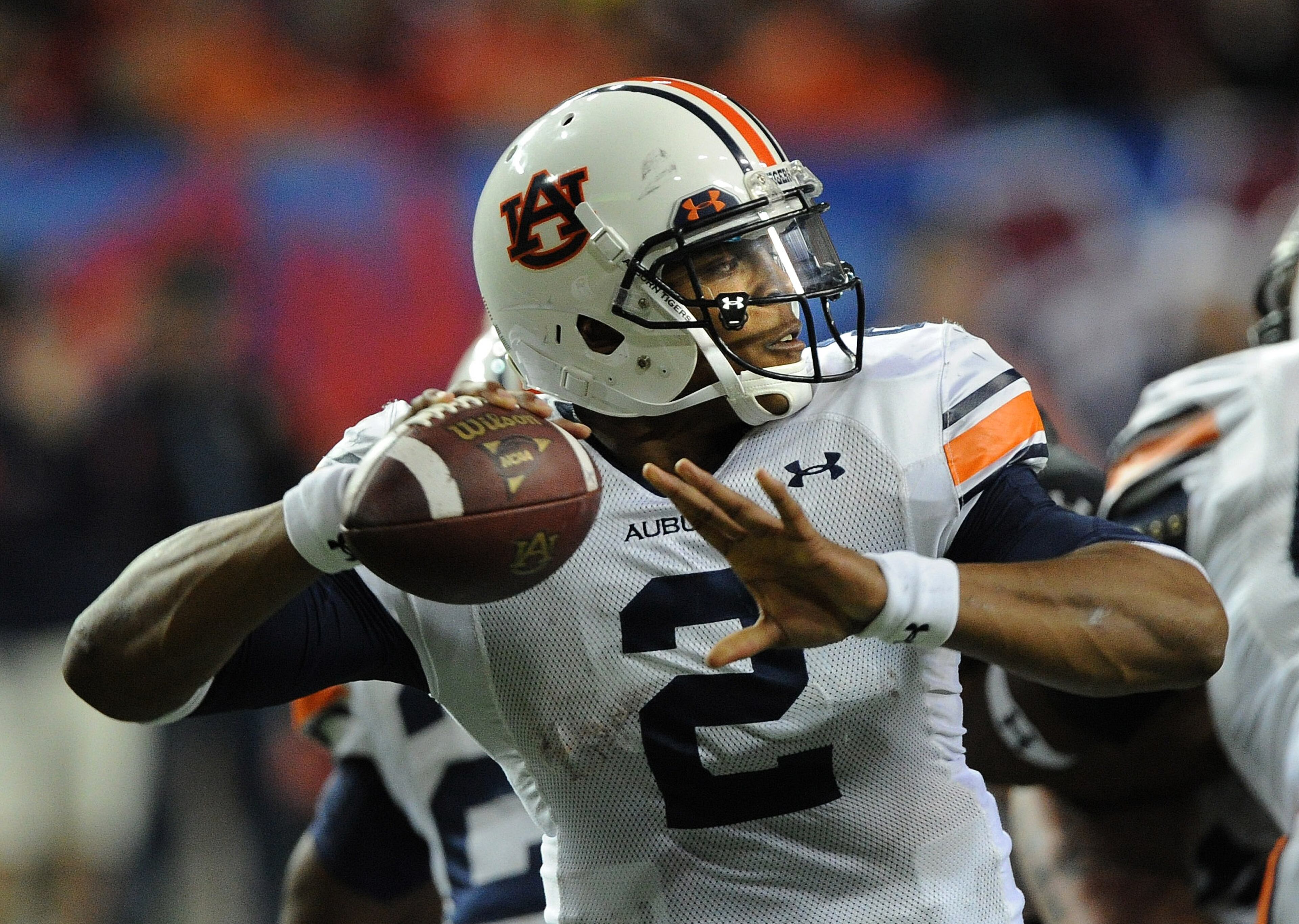 Auburn quarterback Cam Newton looks for an open receiver during the SEC Championship game between Auburn and South Carolina inside the Georgia Dome on Saturday, Dec 4, 2010. Johnny Crawford jcrawford@ajc.com