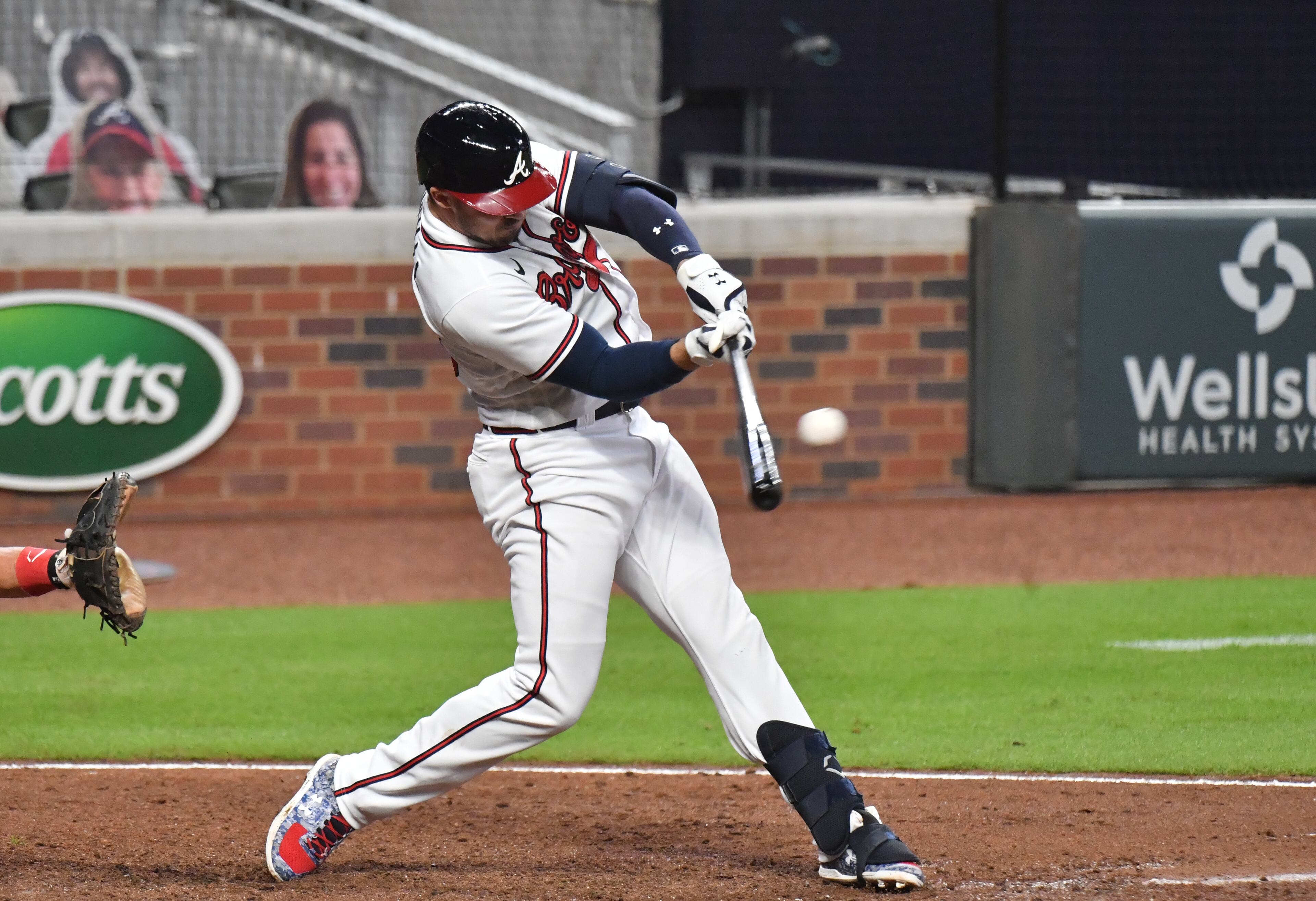 Braves left fielder Adam Duvall (23) hits the game-winning RBI single during the 9th inning in a MLB baseball game at Truist Park on Saturday, August 22, 2020. The Atlanta Braves won 6-5 over the Philadelphia Phillies. (Hyosub Shin / Hyosub.Shin@ajc.com)