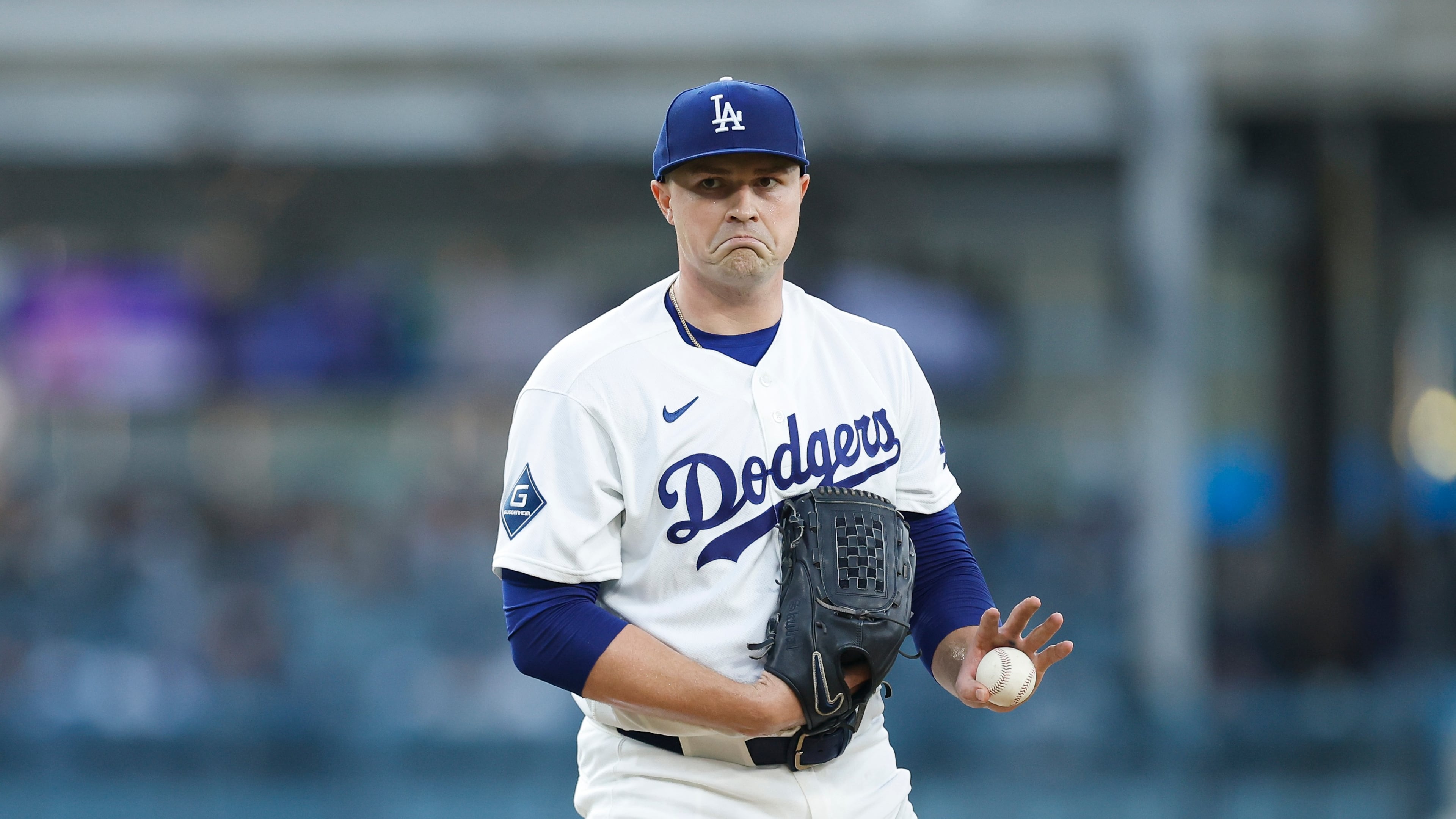 Los Angeles Dodgers starting pitcher Tarik Skubal reacts between batters during the first inning of a baseball game against the Kansas City Royals, Monday, Aug. 10, 2026, in Los Angeles. (AP Photo/Caroline Brehman)