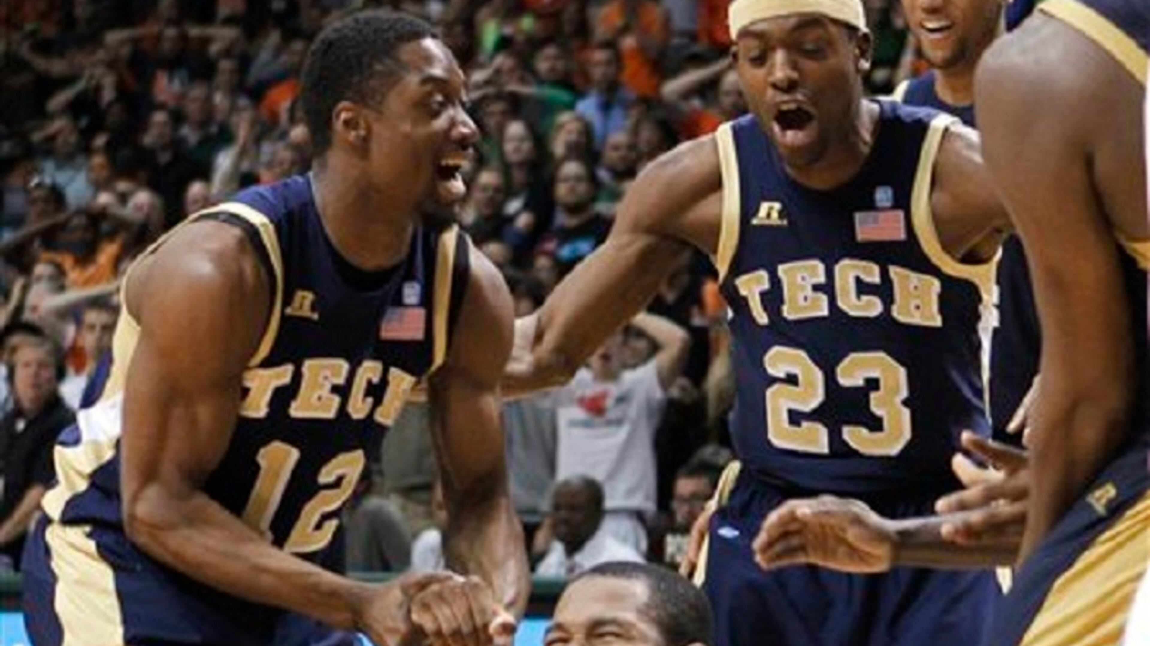 Georgia Tech exults in its victory over mighty Miami.