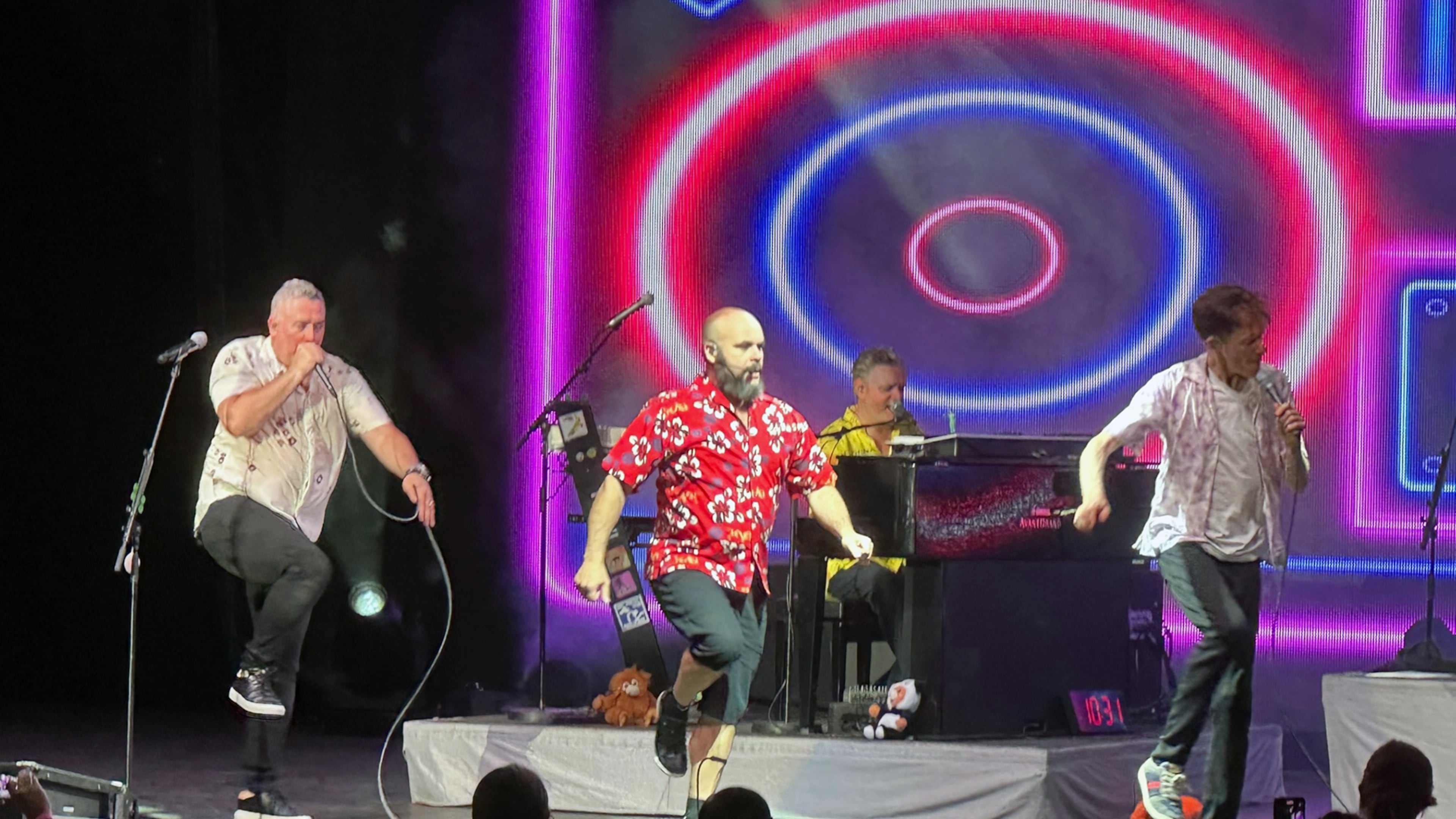 The Barenaked Ladies show off their sick dance moves near the end of their Atlanta concert at Chastain June 20, 2023. RODNEY HO/rho@ajc.com