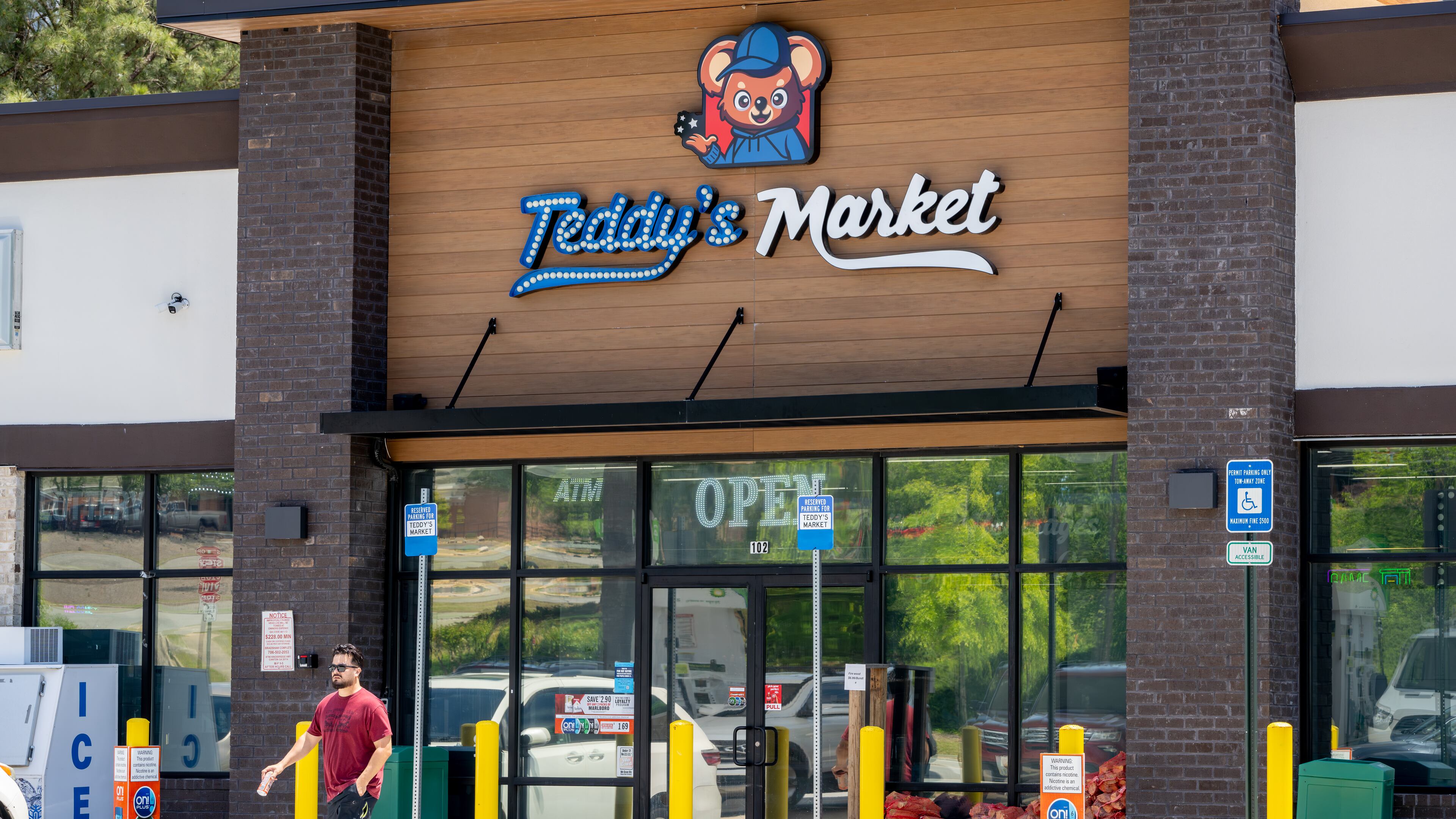 A customer exits Teddy's Market on Prominence Point Parkway in Holly Springs on Tuesday, May 5, 2026. (Ben Hendren for the AJC)