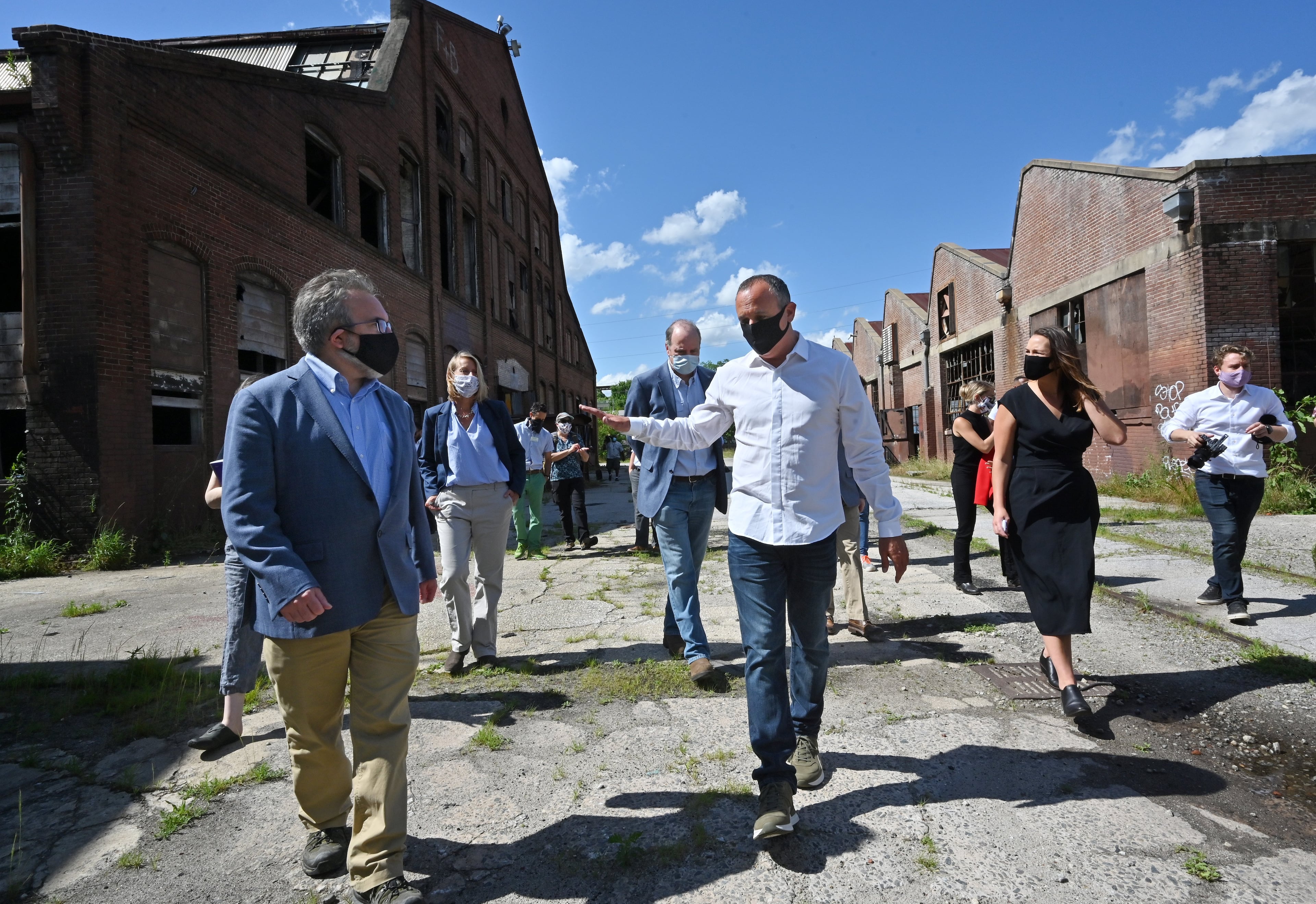 Adam Rosenfelt (center), owner of Atomic Entertainment, gives EPA administrator Andrew Wheeler (left) a tour of Pullman Yards on Thursday, May 28, 2020 during the COVID pandemic. (Hyosub Shin/AJC 2020)