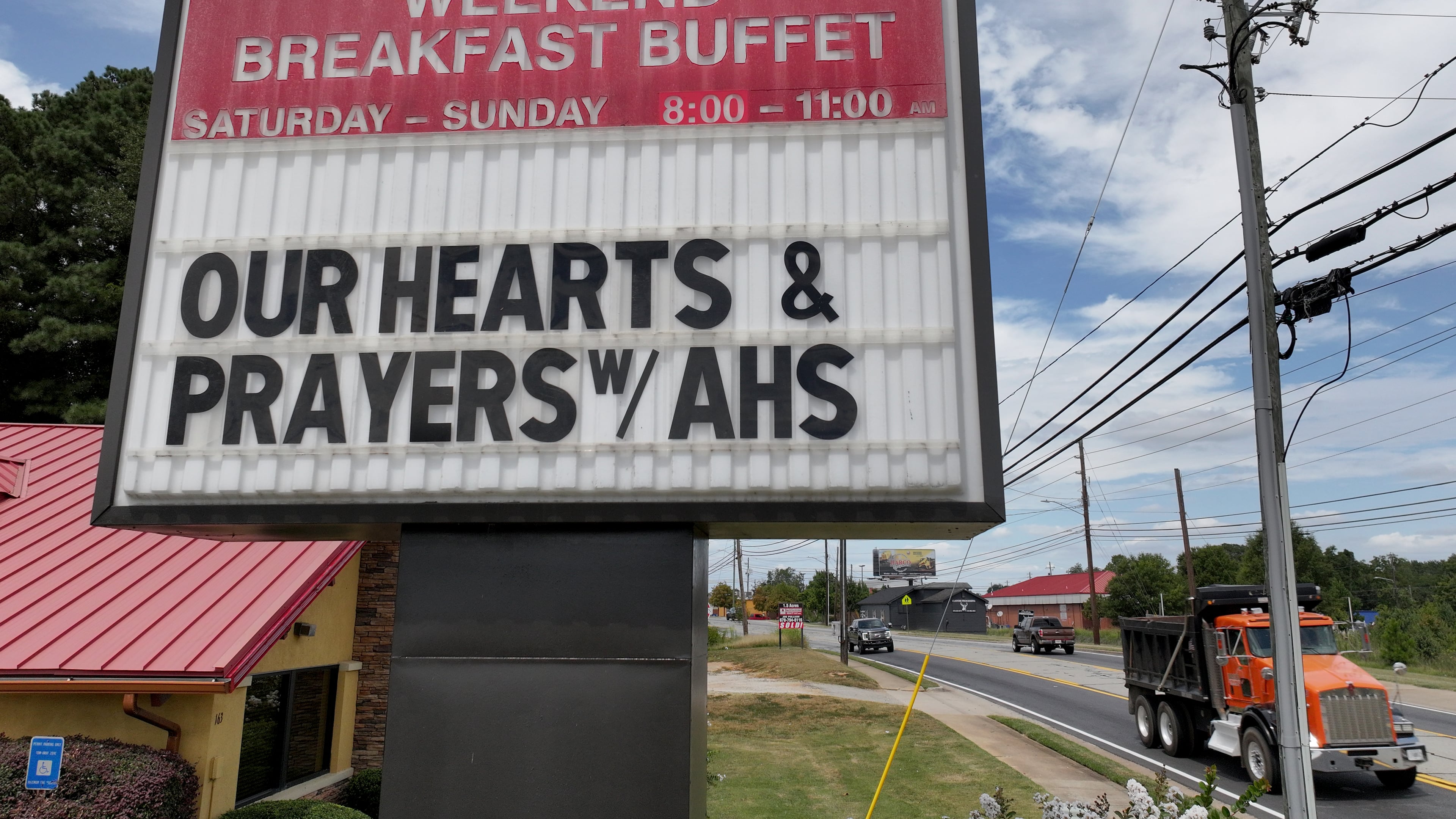 Community support sign for Apalachee High School is displayed outside the Golden Corral Buffet & Grill on East May Street after two students and two teachers were gunned down on the school grounds in Winder. (Hyosub Shin / AJC)