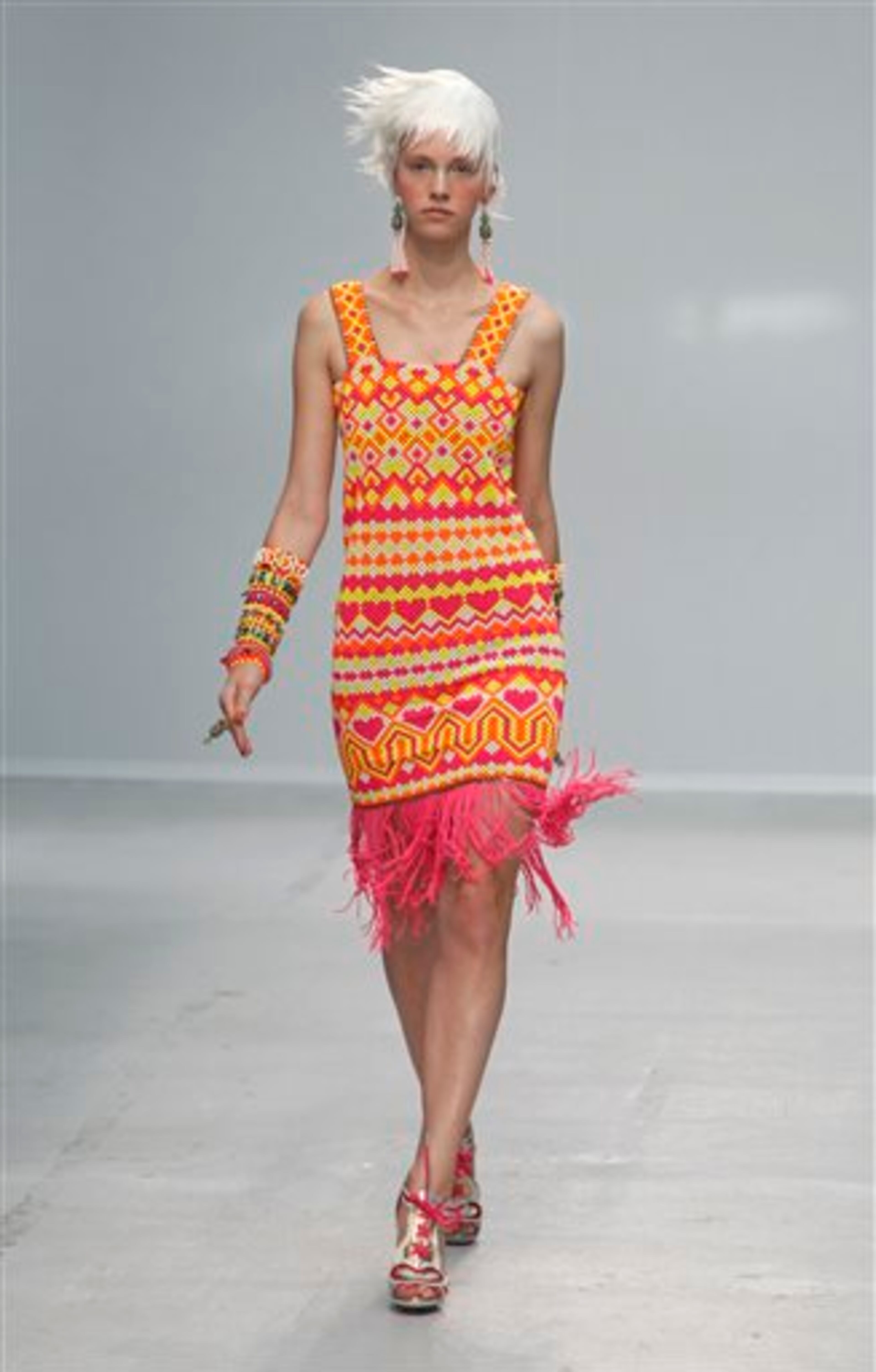 A model wears a creation as part of Indian fashion designer Manish Arora's ready-to-wear Spring-Summer 2014 fashion collection presented in Paris, Thursday, Sept.26, 2013. (AP Photo/Thibault Camus)