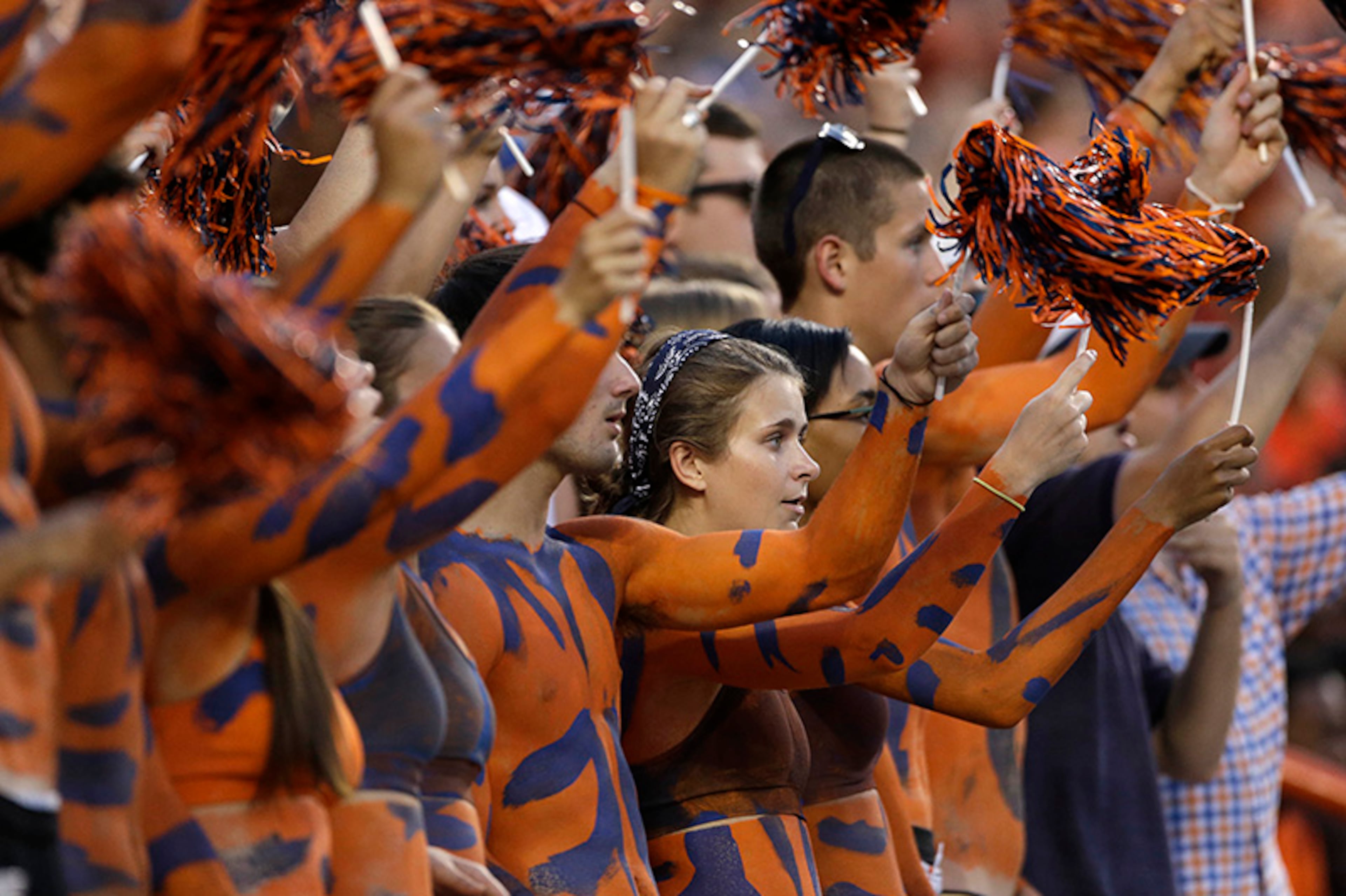 Auburn fans react in the first half of an NCAA college football game against Arkansas State in Auburn, Ala., Saturday, Sept. 7, 2013.