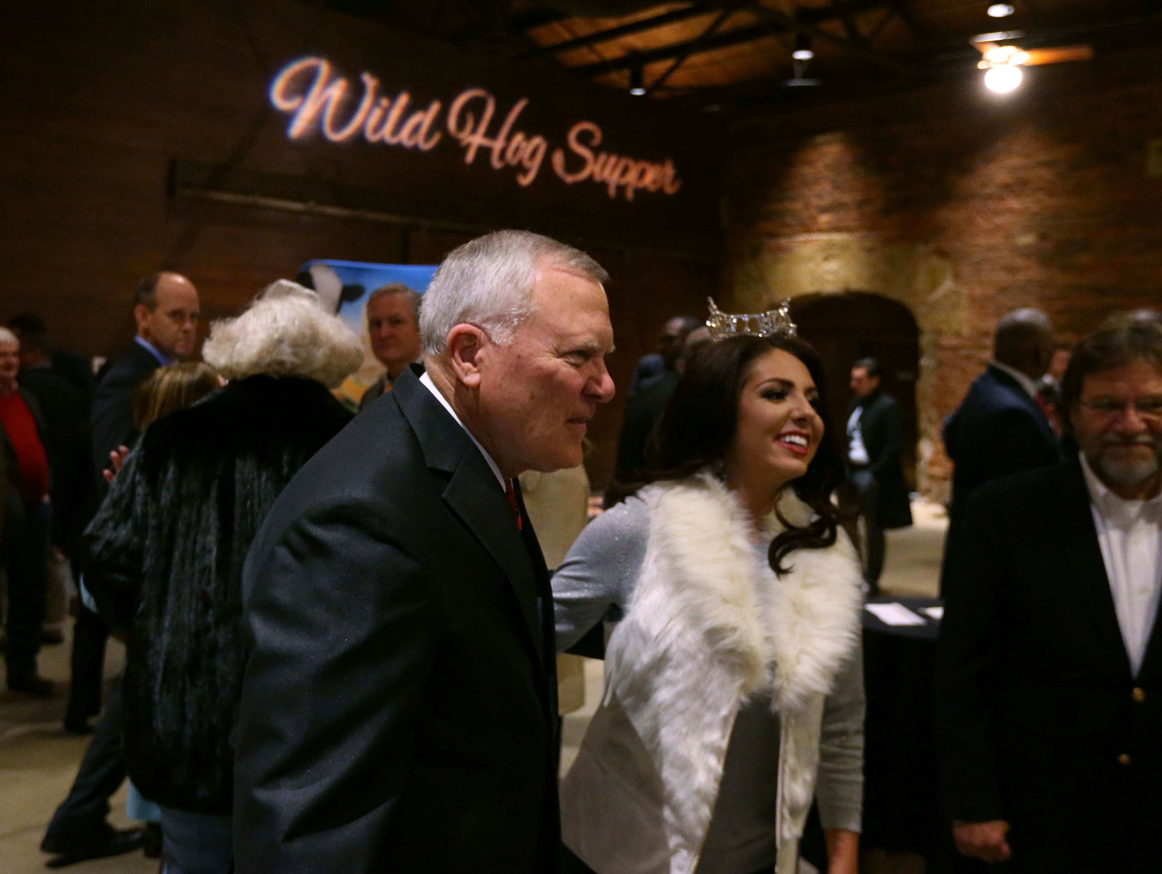 Jan. 10, 2016 - Atlanta - Gov. Nathan Deal mingles with Miss Cobb County, Brooke Doss, at the 54th annual Wild Hog Supper. The event was held at the Georgia Railroad Depot Sunday evening. BOB ANDRES / BANDRES@AJC.COM