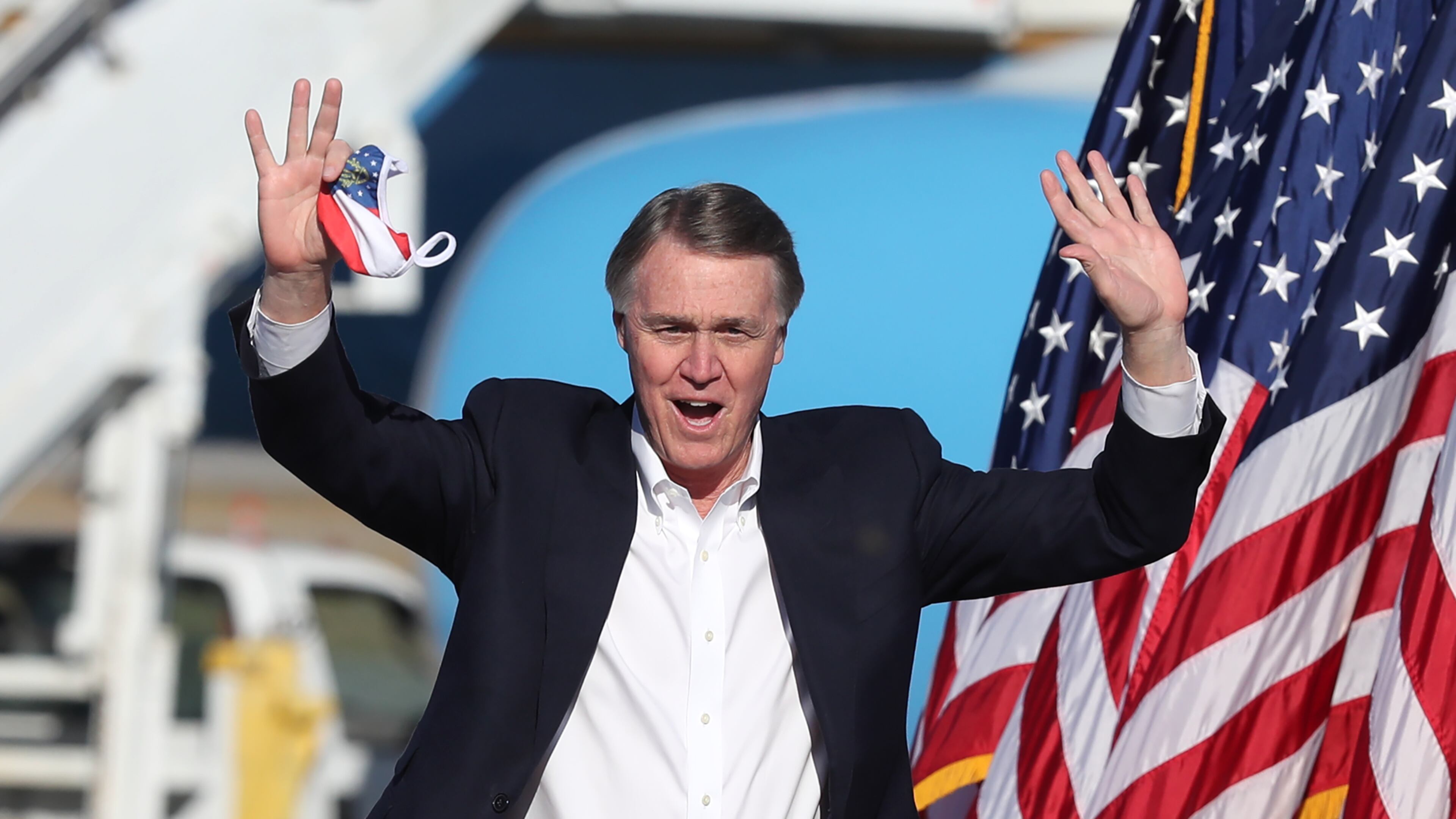 Then Sen. David Perdue arrives for then Vice President Mike Pence's Defend the Majority Rally on Thursday, Dec. 10, 2020, in Augusta, Georgia. A Fulton County judge has rejected Perdue’s request to inspect ballots from the November 2020 election. Perdue lost his senate seat and is now running against Gov. Brian Kemp in 2022 for the GOP nomination. (Curtis Compton/Atlanta Journal-Constitution/TNS)