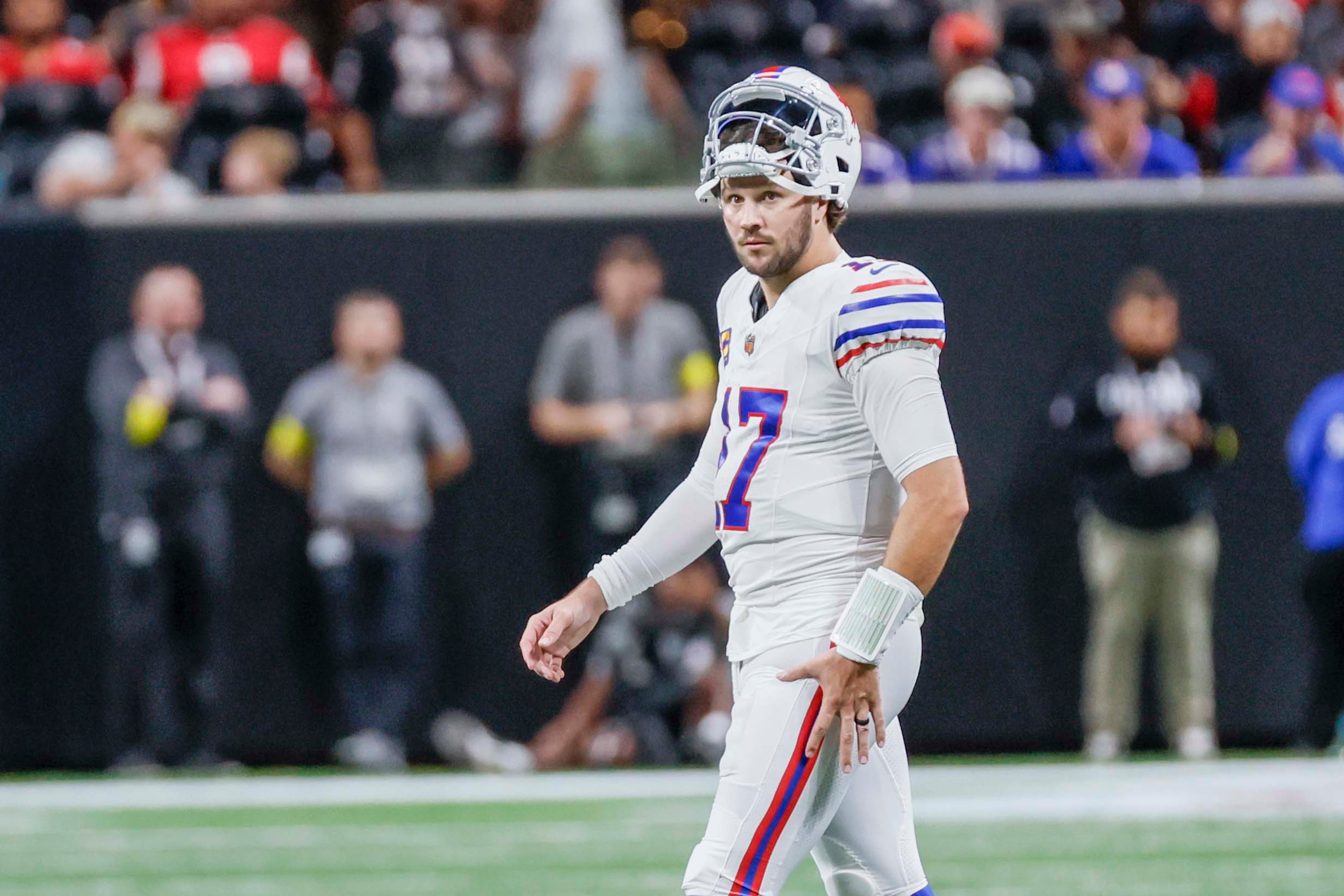 Buffalo Bills quarterback Josh Allen (17) looks at the field as he gets ready to start the thirddown during the second half of an NFL football game against the Buffalo Bills at Mercedes-Benz Stadium in Atlanta on Monday, October 13, 2025. (Miguel Martinez/ AJC)