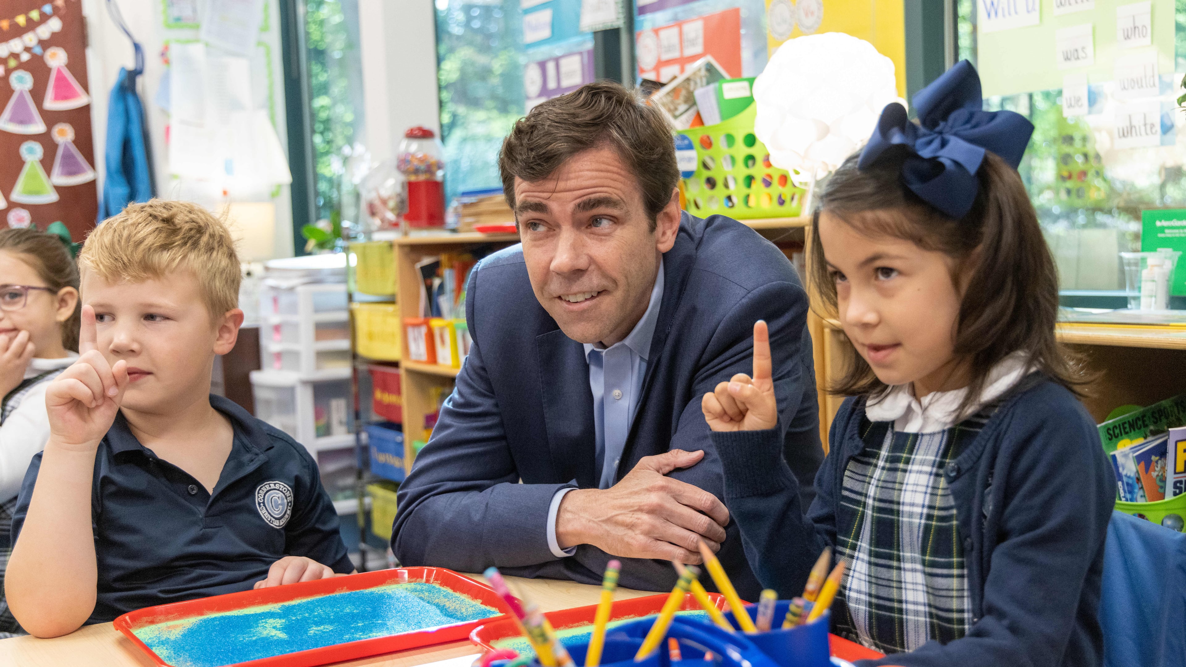 Cornerstone Academy Headmaster Colin Creel (center) watches Katie JohnsonÕs 1st grade class prepare to draw in kinetic sand trays. For the Top Workplace small sized business. PHIL SKINNER FOR THE ATLANTA JOURNAL-CONSTITUTION
Note: he didnÕt want the kids to be identified