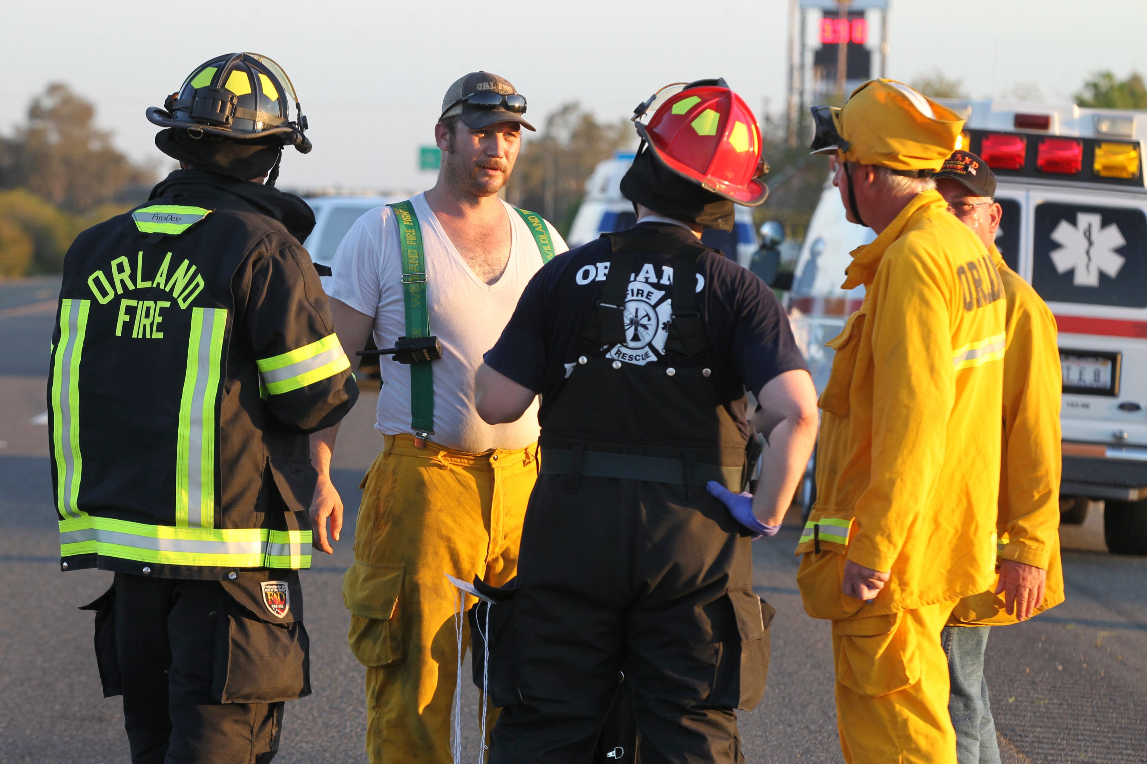 Rescue workers, police and firefighters work the scene where nine people were killed in a three-vehicle crash involving a bus carrying high school students on a visit to a college, Thursday, April 10, 2014, near Orland, Calif. Authorities said it is not yet clear what caused the crash but that it involved a tour bus, a FedEx truck and a Nissan Altima. (AP Photo/The Record Searchlight, Greg Barnette)